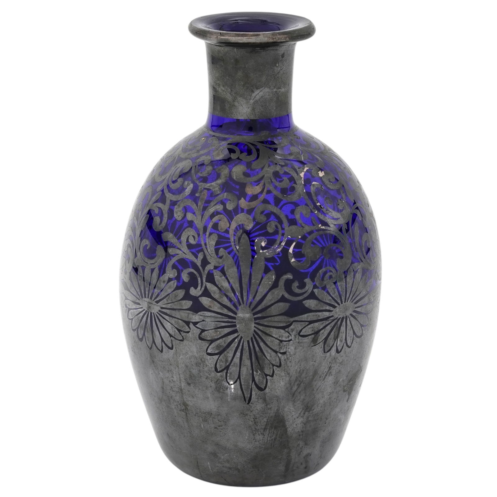 Antique Cobalt Blue & Silver Overlay Glass Decanter: Antique Cobalt Blue & Silver Overlay Glass DecanterEarly to mid 20th centuryCobalt blue glass decanter with a silver floral designed overlay.H 7.5" x Diameter 3.75"