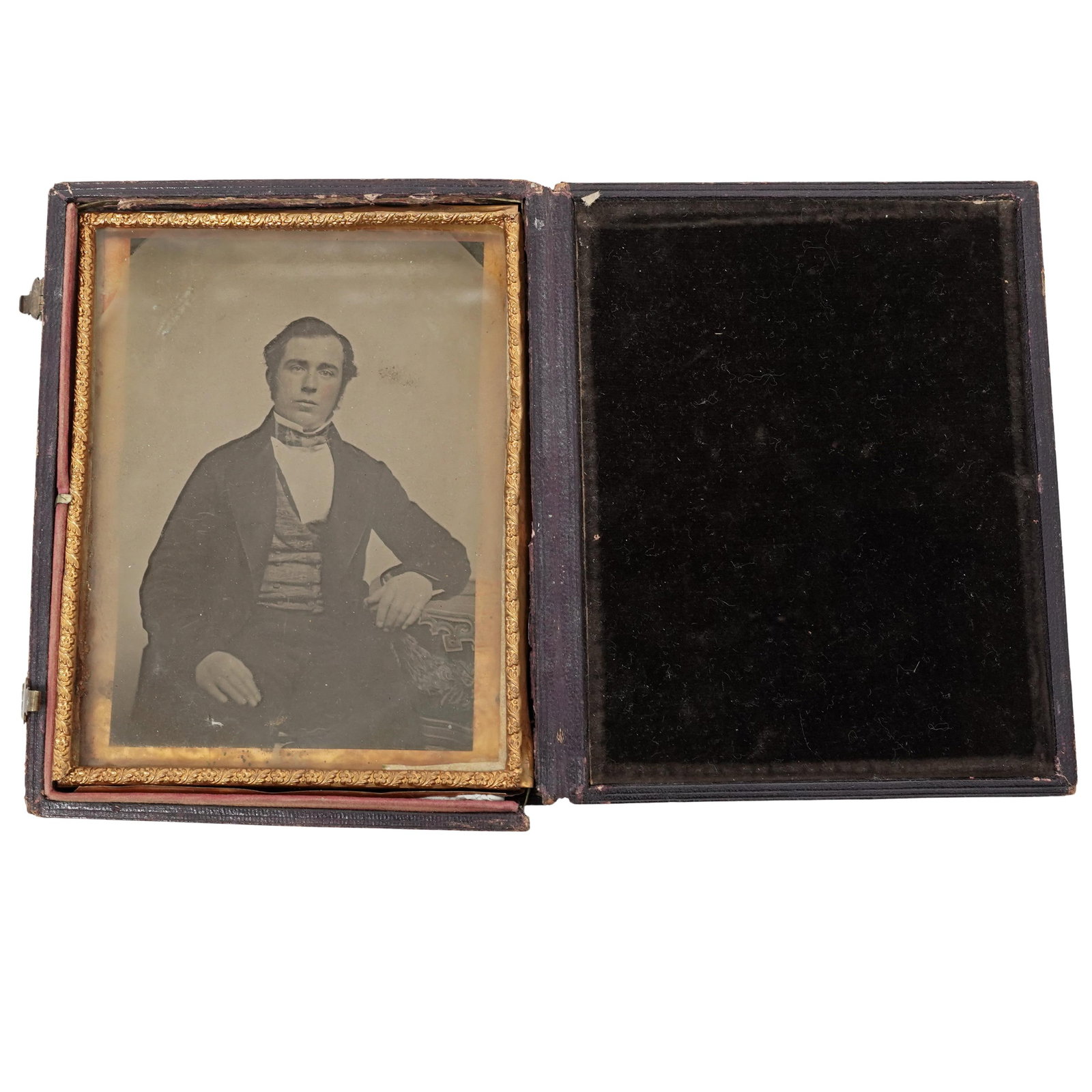 19th Century Daguerreotype Portrait: 19th Century Daguerreotype Portrait19th centuryThis is an authentic 19th-century daguerreotype portrait of a young gentleman in formal Victorian attire, including a dark frock coat, a high-collared wa