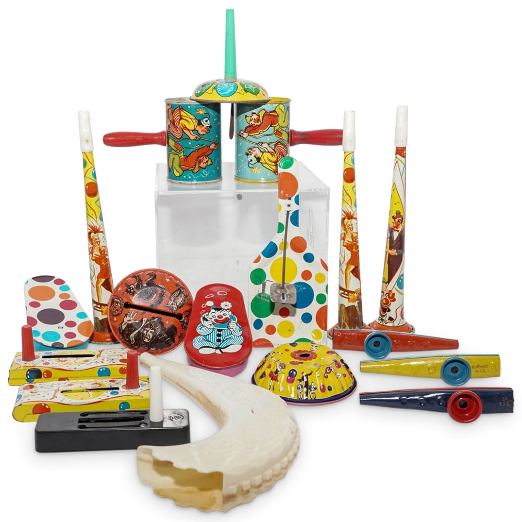 (18 pcs) Vintage Assorted Group OF Party Toys: (18 pcs) Vintage Assorted Group OF Party ToysMid 20th century, AmericanVibrant group of party toys comprising:(6) The collection includes five classic metal "clackers" or ratchets and one late-century
