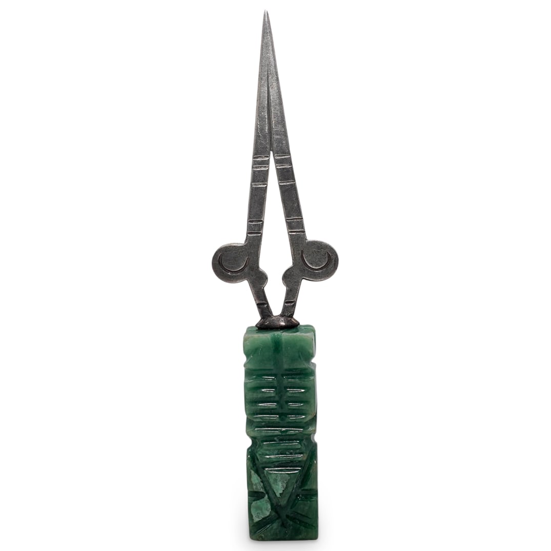 Mexican Sterling Silver & Carved Onyx Letter Opener: Mexican Sterling Silver & Carved Onyx Letter Opener20th Century. Mexico.A vintage Mexican souvenir letter opener with sterling silver blade and figurative handle made of hand-carved green onyx represe