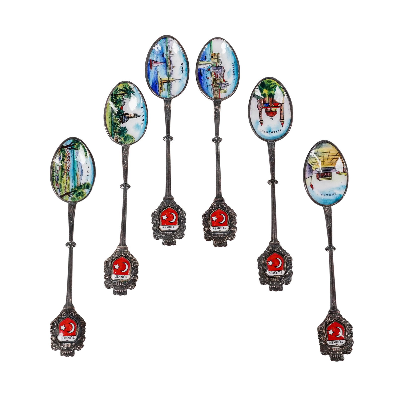 (6 Pc) Turkish Cities Enameled Souvenir Spoons: (6 Pc) Turkish Cities Enameled Souvenir Spoons20th century, TurkishThis set of six vintage Turkish souvenir spoons depicts various iconic cities in Turkey, in original velvet lined presentation box. E