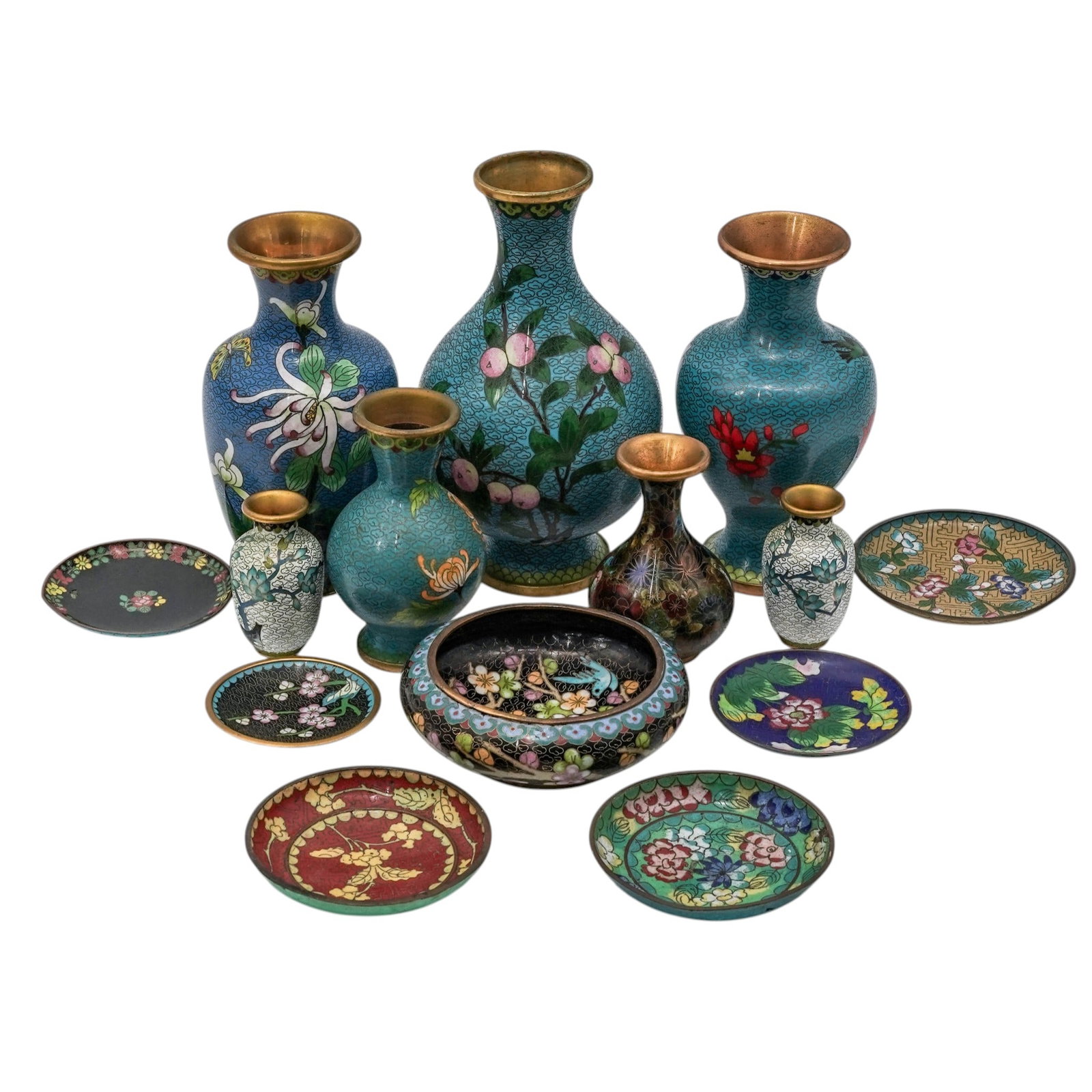 (14pc) Vintage Chinese Cloisonné Enamel Collection: 14pc) Vintage Chinese Cloisonné Enamel Collection 20th century, Chinese The lot of 14 Cloisonne items include: (2) off-white Vases / 3" tall / with paper sticker (made in China) (1) Black flower moti