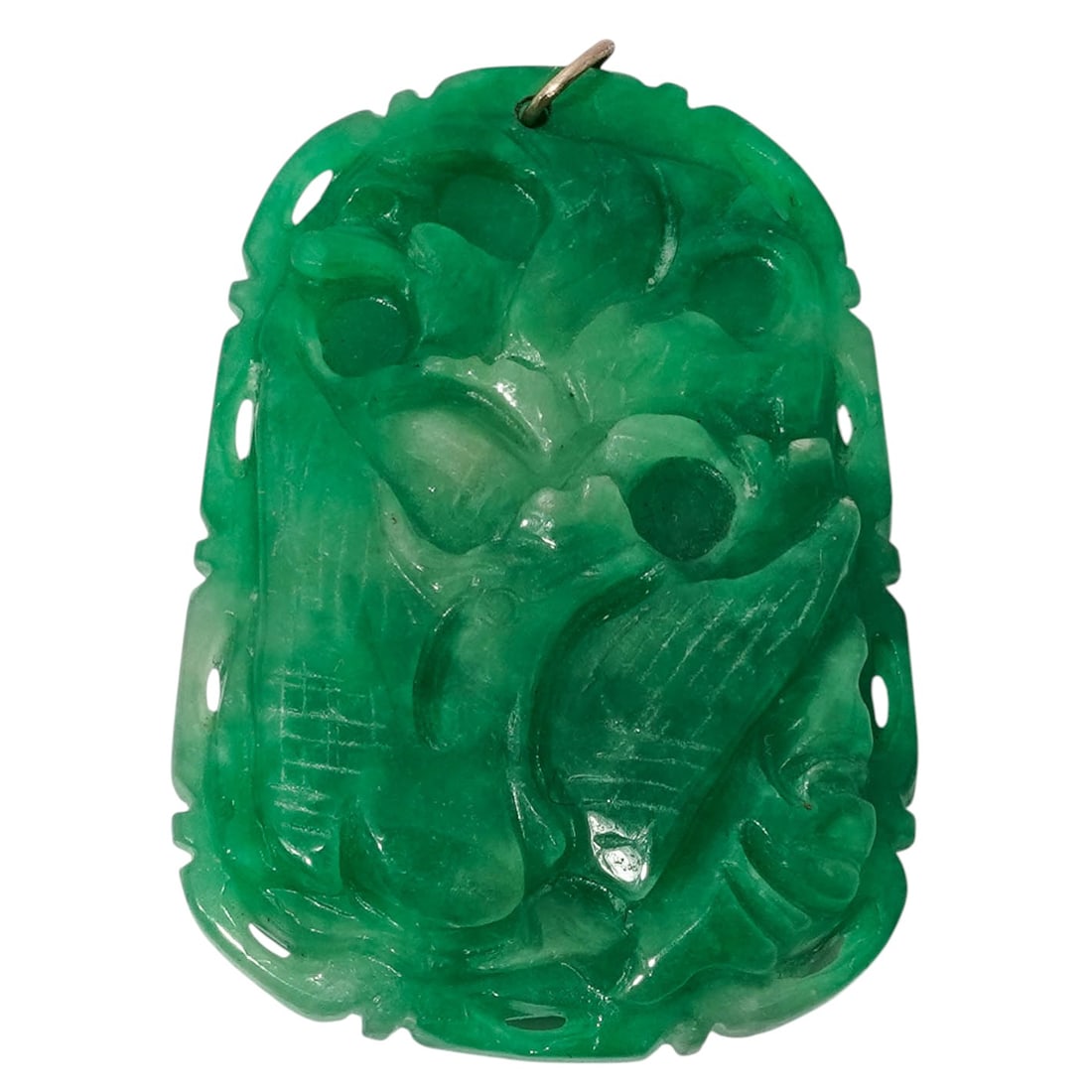 Chinese Carved Jade Yin & Yang Pendant: Chinese Carved Jade Yin & Yang Pendant20th century, ChineseA Chinese carved jade pendant, one side features a curling dragon and the other side features a carved phoenix. The presence of both indicate