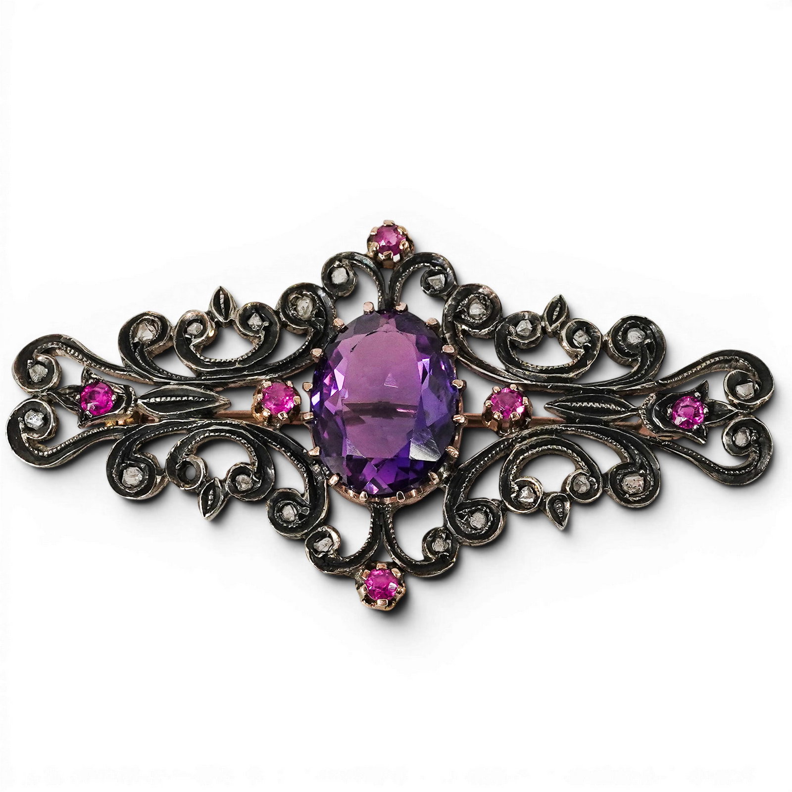 Antique Silver-Topped 14k Gold Amethyst Pink Sapphire & Diamond Brooch: Antique Silver-Topped 14k Gold Amethyst Pink Sapphire & Diamond Brooch Late 19th - Early 20th Century, European Belle Époque silver-topped 14k yellow gold brooch, centering a prong-set oval mixed-cut