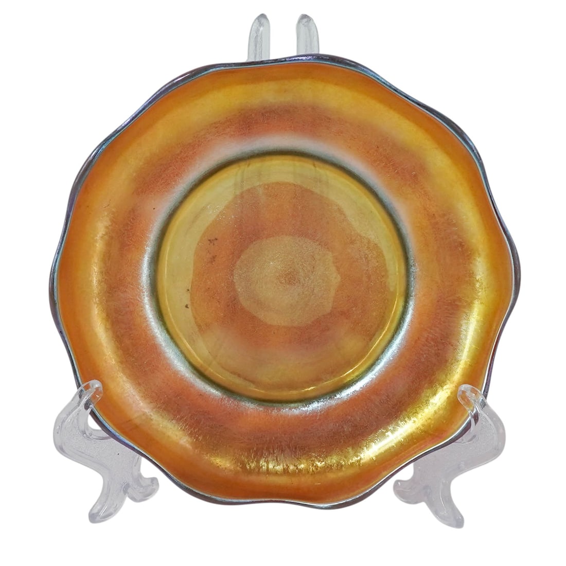 Louis C. Tiffany Favrile Glass Bowl: Louis C. Tiffany Favrile Glass Bowl 1895-1910. American Louis Comfort Tiffany Favrile glass ruffled underplate, hand-blown circa 1895–1910. The shallow, low-profile design features an undulating, ha