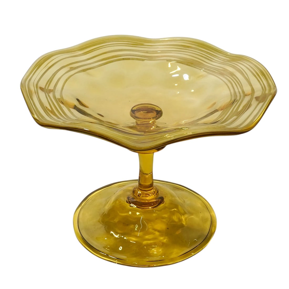 Vintage Art Glass Footed Compote: Vintage Art Glass Footed Compote 20th century, European Vibrant translucent yellow topaz color throughout the compote. It features a distinct ruffled, wavy edge with concentric rings detailing the