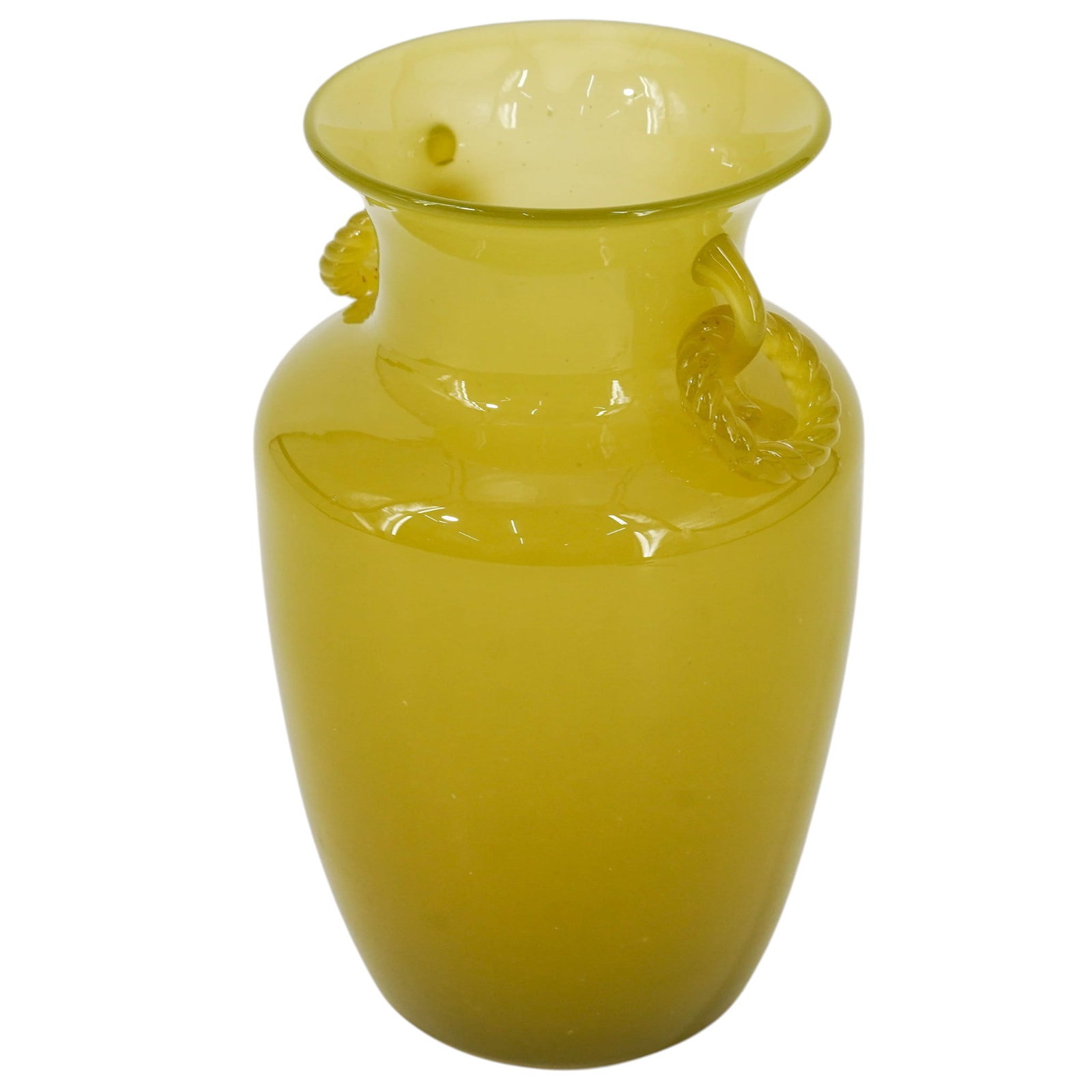 Antique Yellow Uranium Glass Vase: Antique Yellow Uranium Glass Vase Early 20th c. Antique yellow uranium glass vase featuring a body with a flared rim, tapered base, and twisted loose ring handles. H: 6.25" Dia: 3.85"