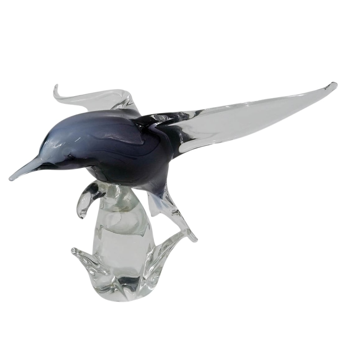 Murano Art Glass Hummingbird Sculpture: Murano Art Glass Hummingbird Sculpture 20th century, USA The sculpture of a hummingbird in mid-flight, perched atop a stylized flower base. The main body of a bird is crafted with a deep