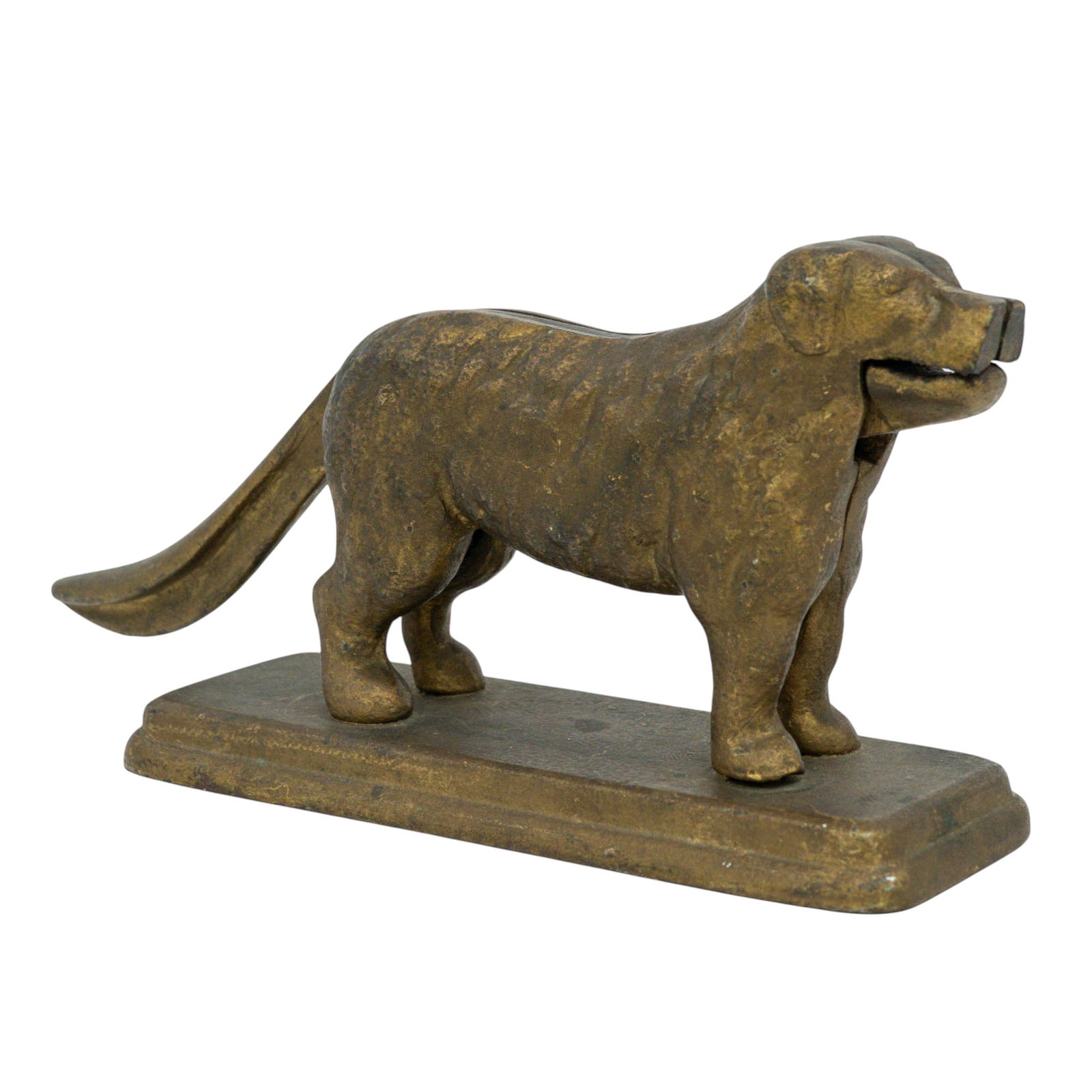 Vintage Mechanical Figural Cast Iron St. Bernard Nutcracker: Vintage Mechanical Figural Cast Iron St. Bernard Nutcracker c. 1910-1940, USA The piece is crafted from cast iron. It displays a distinct, aged gold-toned patina with textured surface detailing that