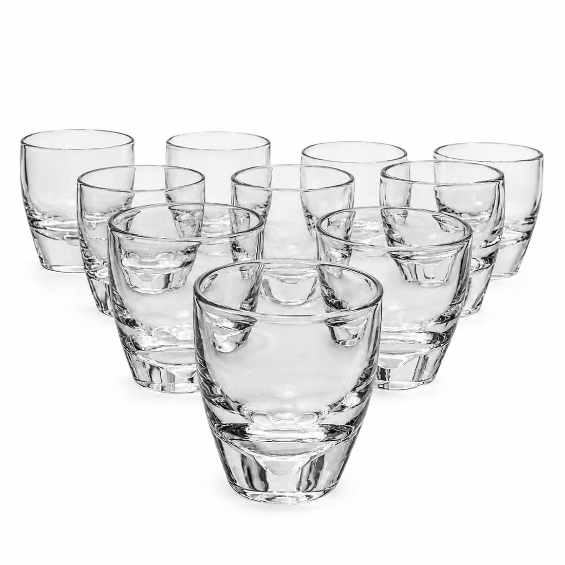 (11pc) Steuben Glass Shot Glasses By Donald Pollard: (11pc) Steuben Glass Shot Glasses By Donald Pollard 1953. American These Steuben crystal shot glasses, designed by Donald Pollard in 1953, feature a minimalist silhouette crafted from heavy,