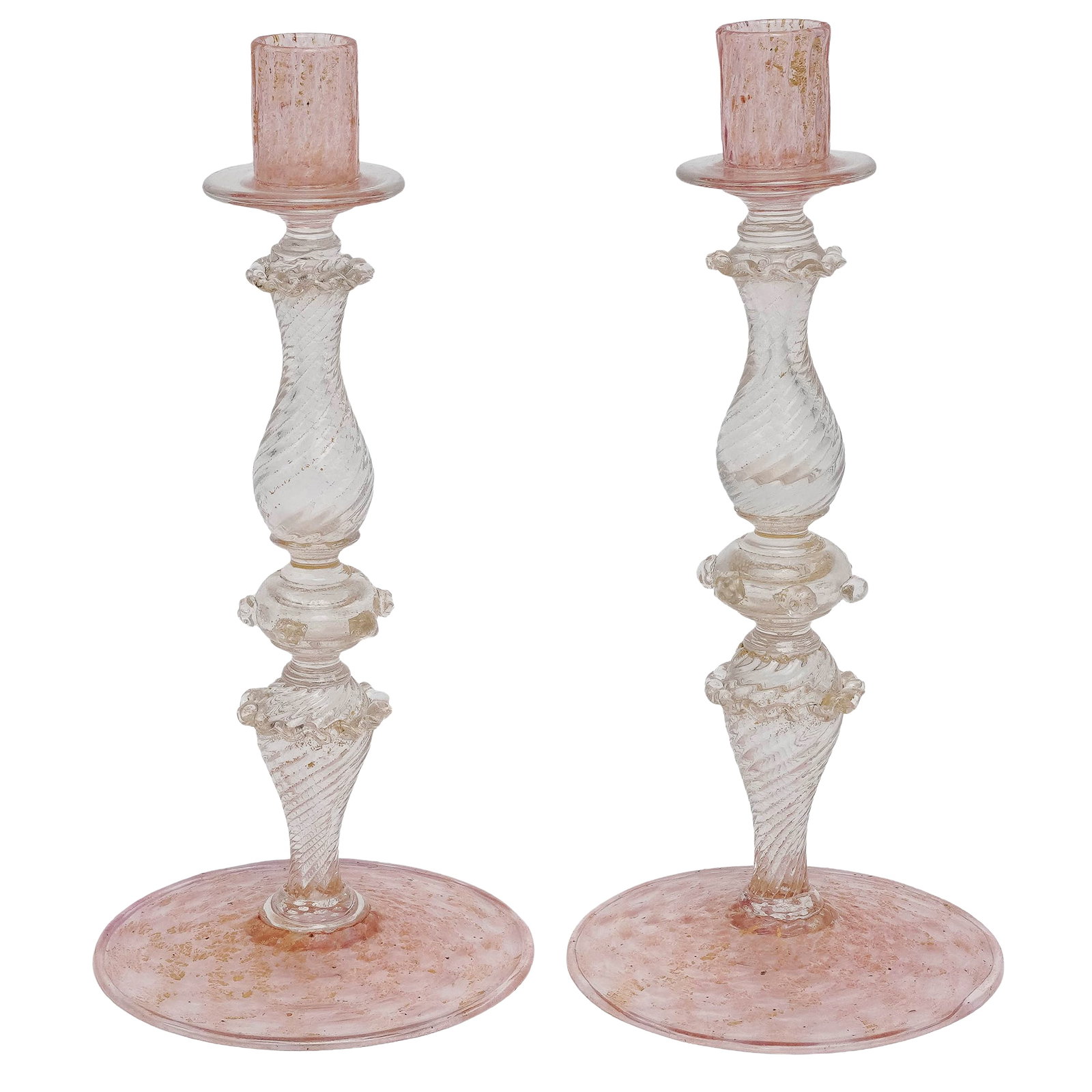 Pair Venetian Glass Pink & Gold Candlesticks: Pair Venetian Glass Pink & Gold Candlesticks 20th century, Venetian The candlesticks sculpted with a twisted, baluster-style silhouette, decorative ridged rings and textured details. Infused with refl