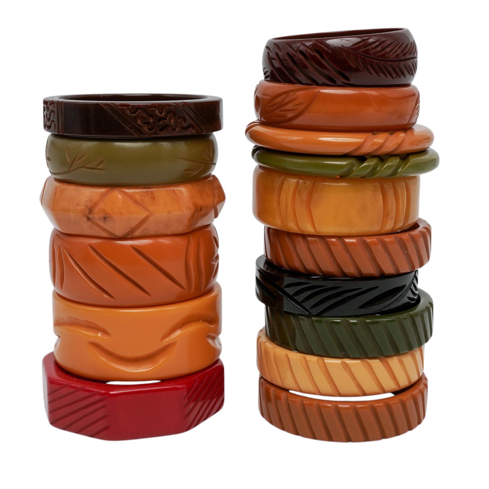 (16 pcs) Vintage Carved Bakelite Bangles: (16 pcs) Vintage Carved Bakelite Bangles Early to mid 20th century A set of sixteen bakelite bangles with carved details in a variety of colors. Sizes range approx. 6.5"-7.75". L 2.625"- 3.375"