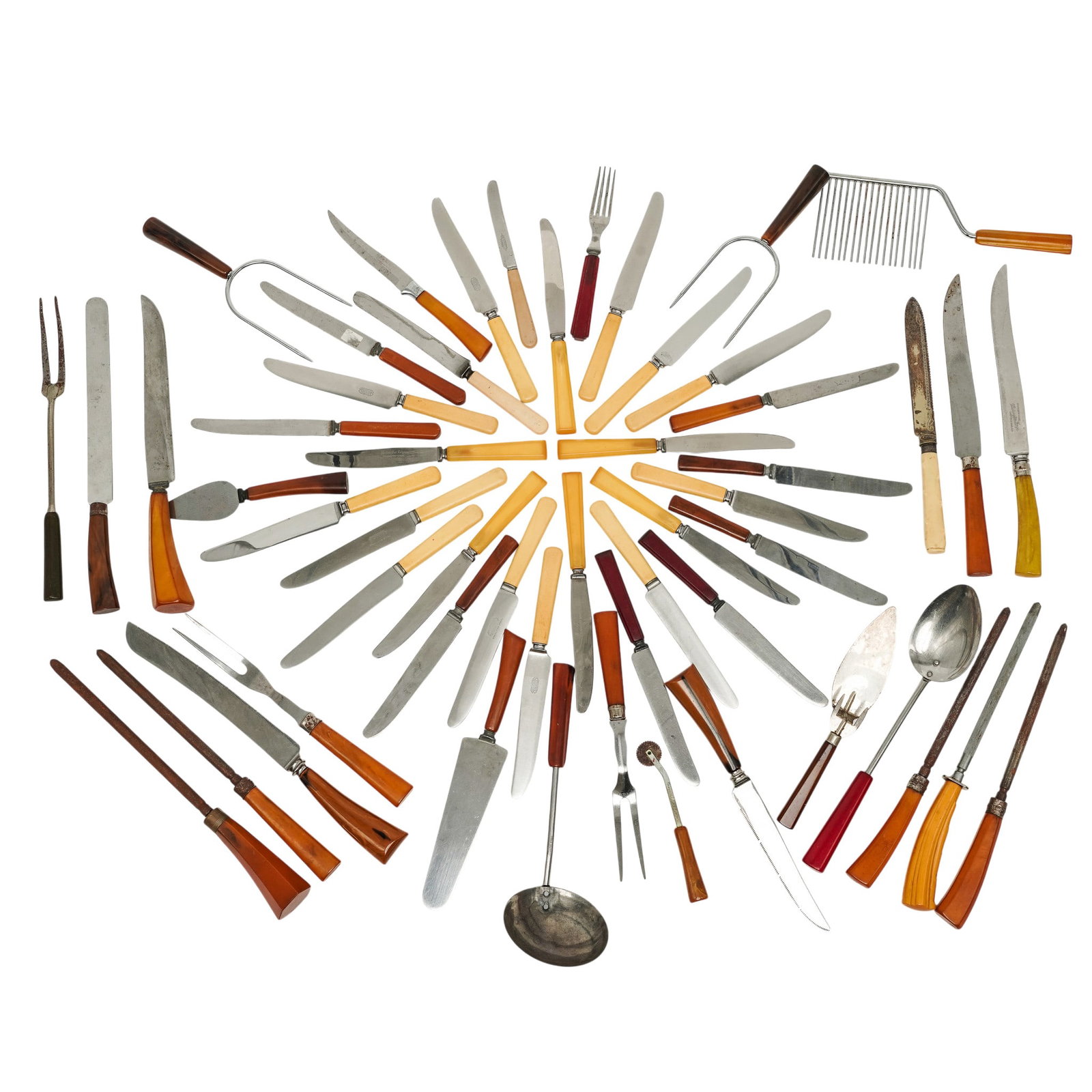 Large Collection Of Bakelite & Celluloid Serving Utensils: Large Collection Of Bakelite & Celluloid Serving Utensils Mid 20th Century Assorted mid-century serving pieces including knives, forks, ladles, spreaders, carving utensils, and kitchen tools with