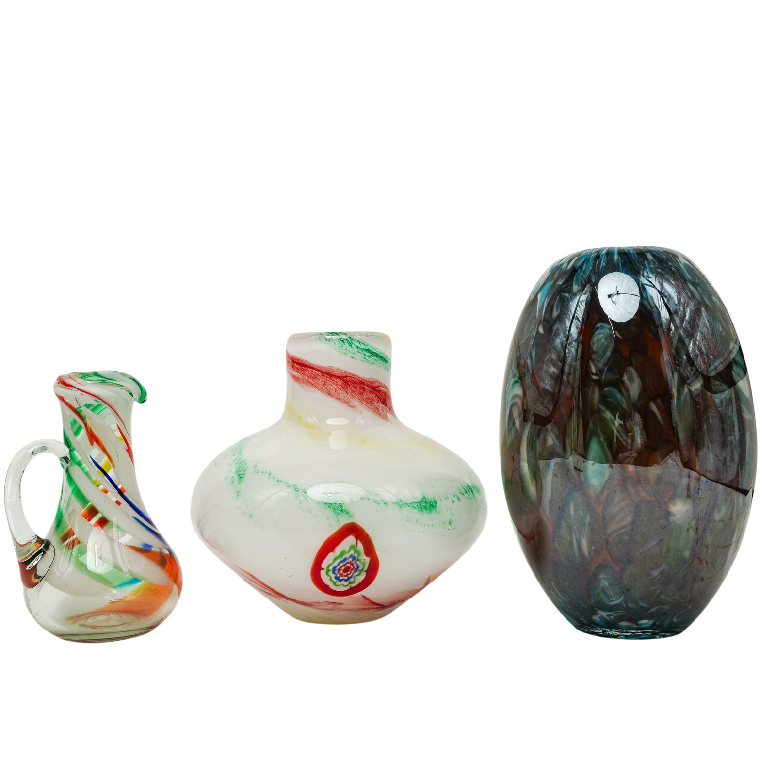 (3 pc) Vintage Art Glass Vases & Pitcher: (3 pc) Vintage Art Glass Vases & Pitcher Late 20th Century, USA Vintage grouping of art glass vases including a white bulbous vase with millefiori and aventurine decoration, an oval form vase with smo