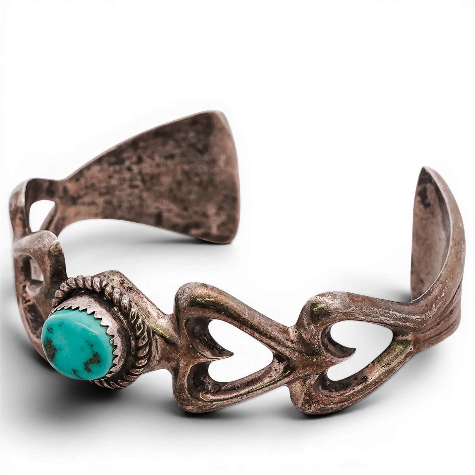 Vintage Elaine Sam Navajo Sterling Silver & Turquoise Cuff Bracelet: Vintage Elaine Sam Navajo Sterling Silver & Turquoise Cuff Bracelet 1970s-1980s, USA Cast sterling silver cuff by Elaine Sam set with a central turquoise cabochon in a rope-twist bezel, with sculptura