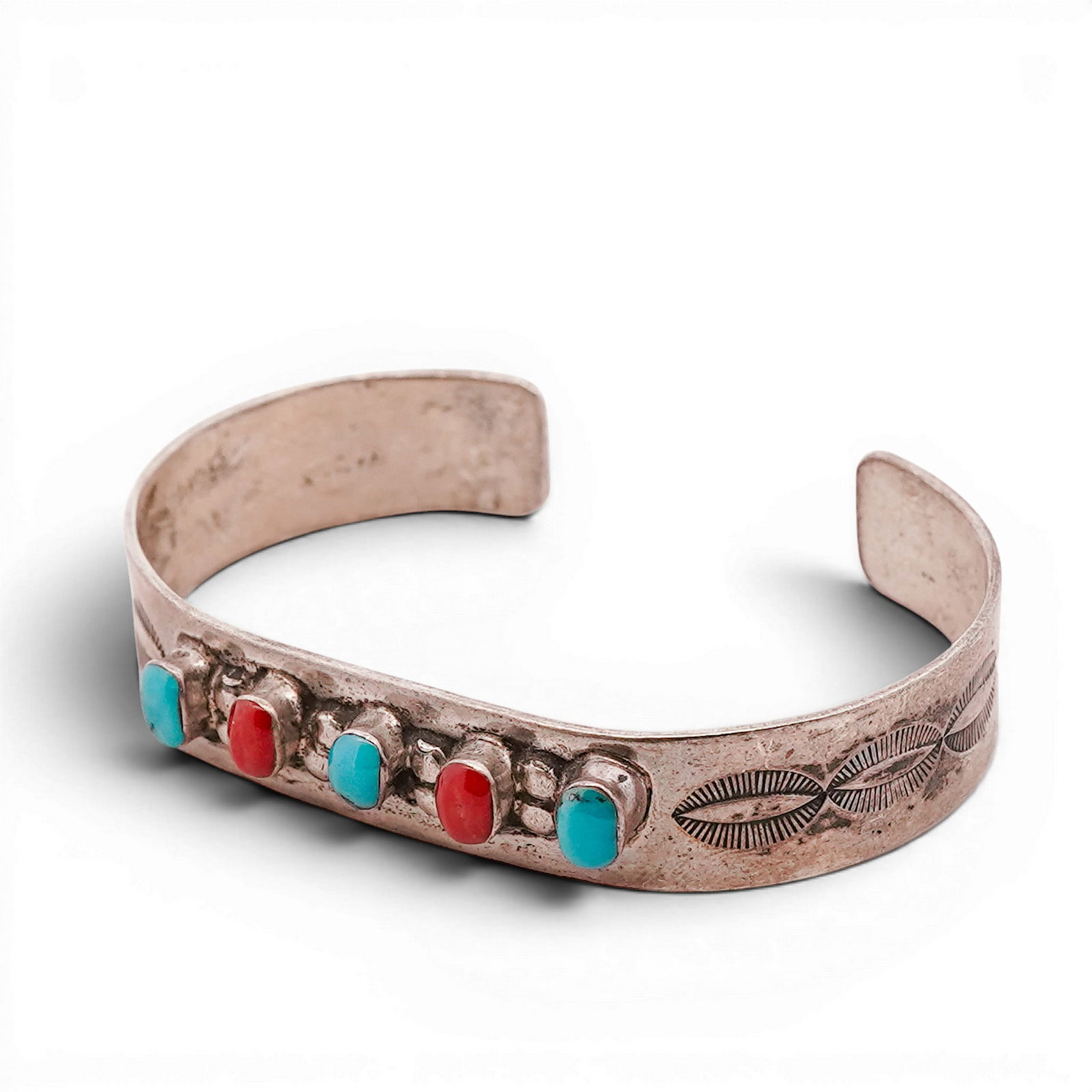 Vintage Navajo Sterling Silver Turquoise & Coral Cuff Bracelet Signed: Vintage Navajo Sterling Silver Turquoise & Coral Cuff Bracelet Signed 1970s-1980s, USA Hand-fabricated cuff bracelet featuring a linear arrangement of alternating turquoise and red coral cabochons, ea