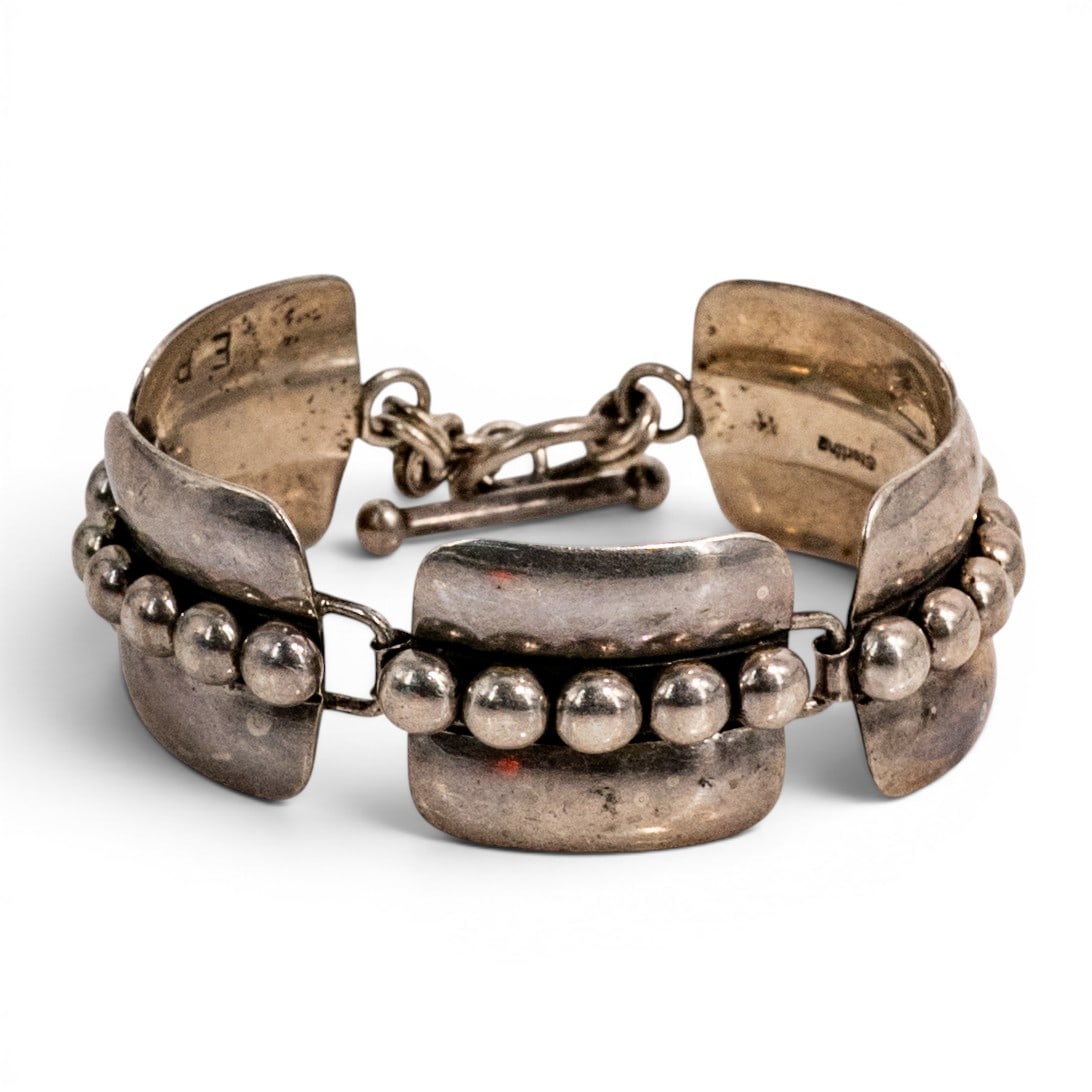 Artie Yellowhorse Navajo Sterling Silver Link Bracelet: Artie Yellowhorse Navajo Sterling Silver Link Bracelet 1990s–2000s, USA Navajo sterling silver bracelet by Artie Yellowhorse, featuring five articulated rectangular silver link panels with rounded r