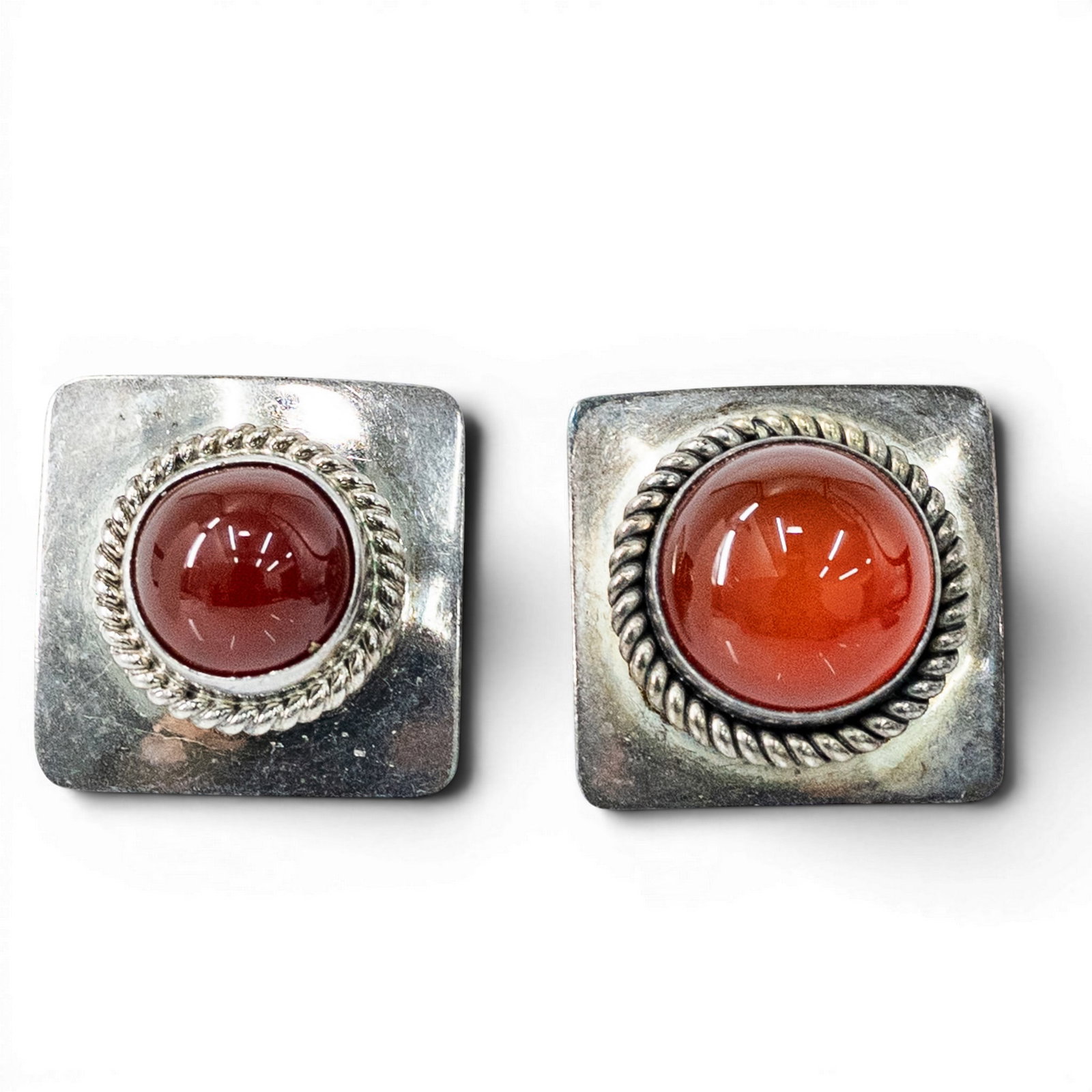 Vintage Artie Yellowhorse Sterling Silver & Carnelian Earrings: Vintage Artie Yellowhorse Sterling Silver & Carnelian Earrings 1970s–1980s, USA Pair of Southwestern sterling silver square-form earrings by Artie Yellowhorse each set with round uniquely sized carn