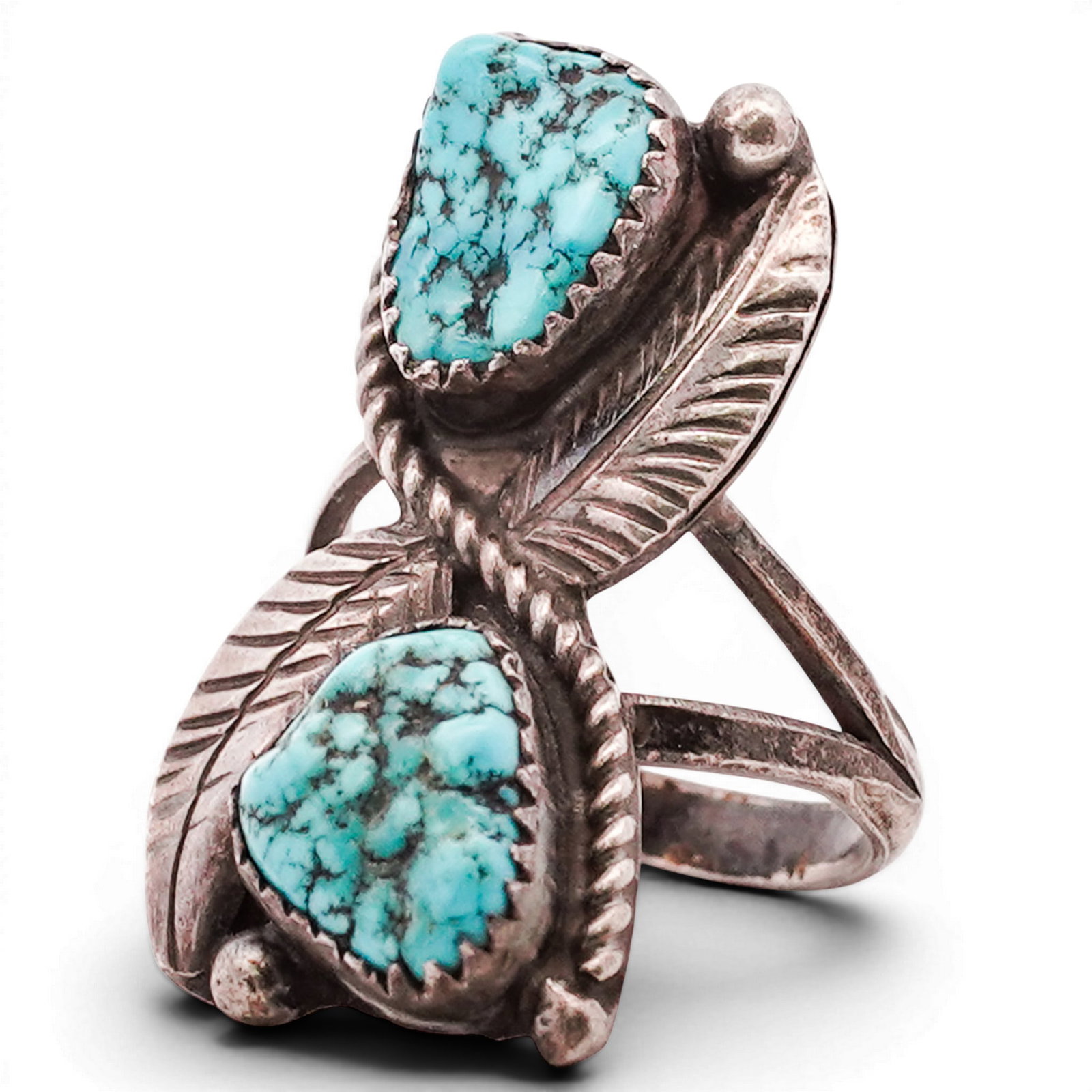 Vintage Navajo Sterling Silver & Turquoise Ring Signed: Vintage Navajo Sterling Silver & Turquoise Ring Signed 1970s-1980s, USA Sterling silver ring set with two turquoise cabochons in serrated bezel settings, joined by twisted rope element with applied le