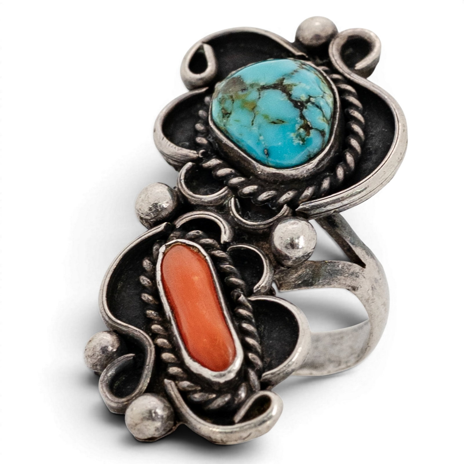 Vintage Navajo Sterling Silver Turquoise & Coral Ring: Vintage Navajo Sterling Silver Turquoise & Coral Ring 1970s-1980s, USA Vertical double-stone ring featuring an oval turquoise cabochon with natural matrix and an elongated coral cabochon, each set in 