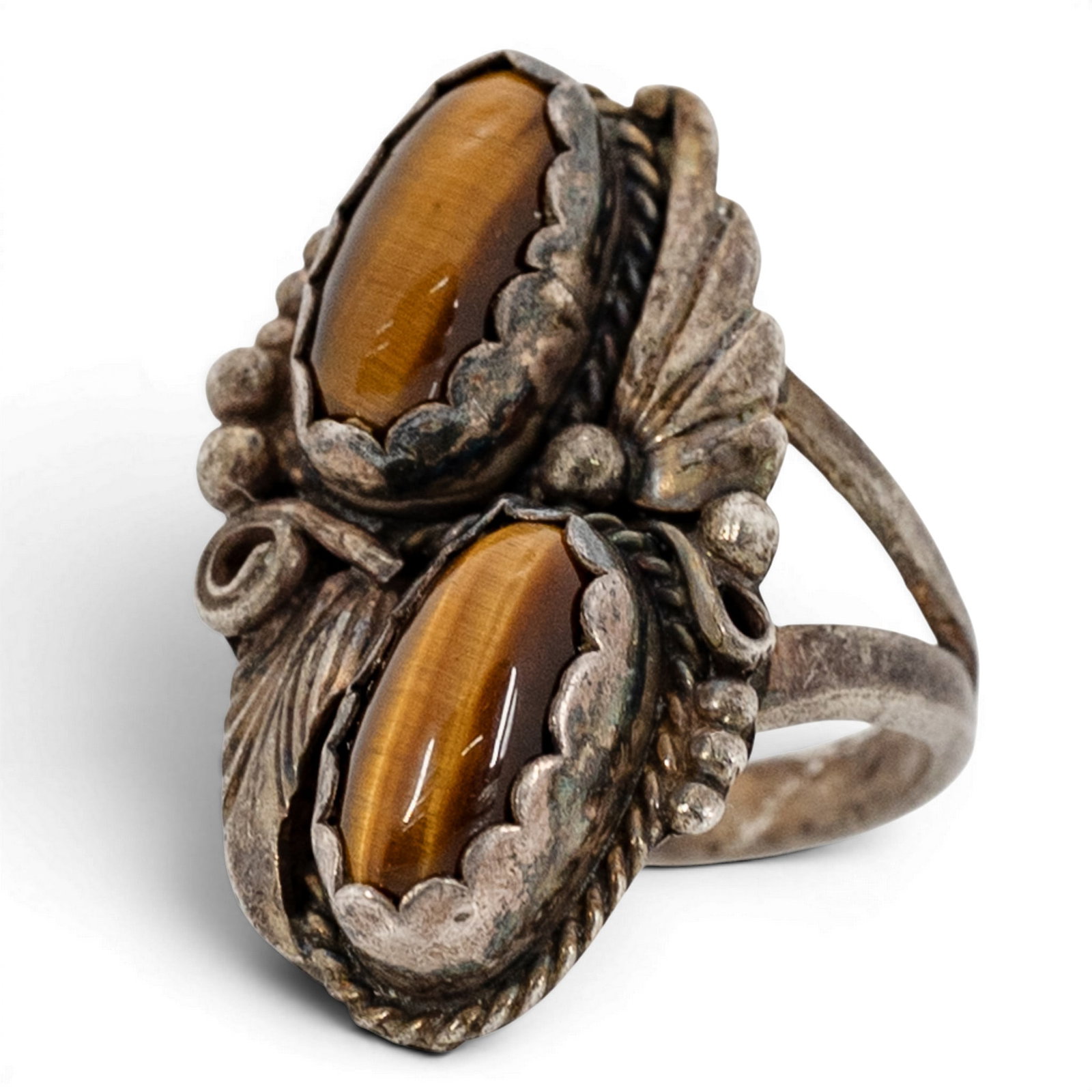 Vintage Navajo Sterling Silver & Double Tiger’s Eye Ring Signed: Vintage Navajo Sterling Silver & Double Tiger’s Eye Ring Signed 1970s-1980s, USA Vertical double-stone ring set with two elongated oval tiger’s eye cabochons exhibiting strong chatoyancy, each in 