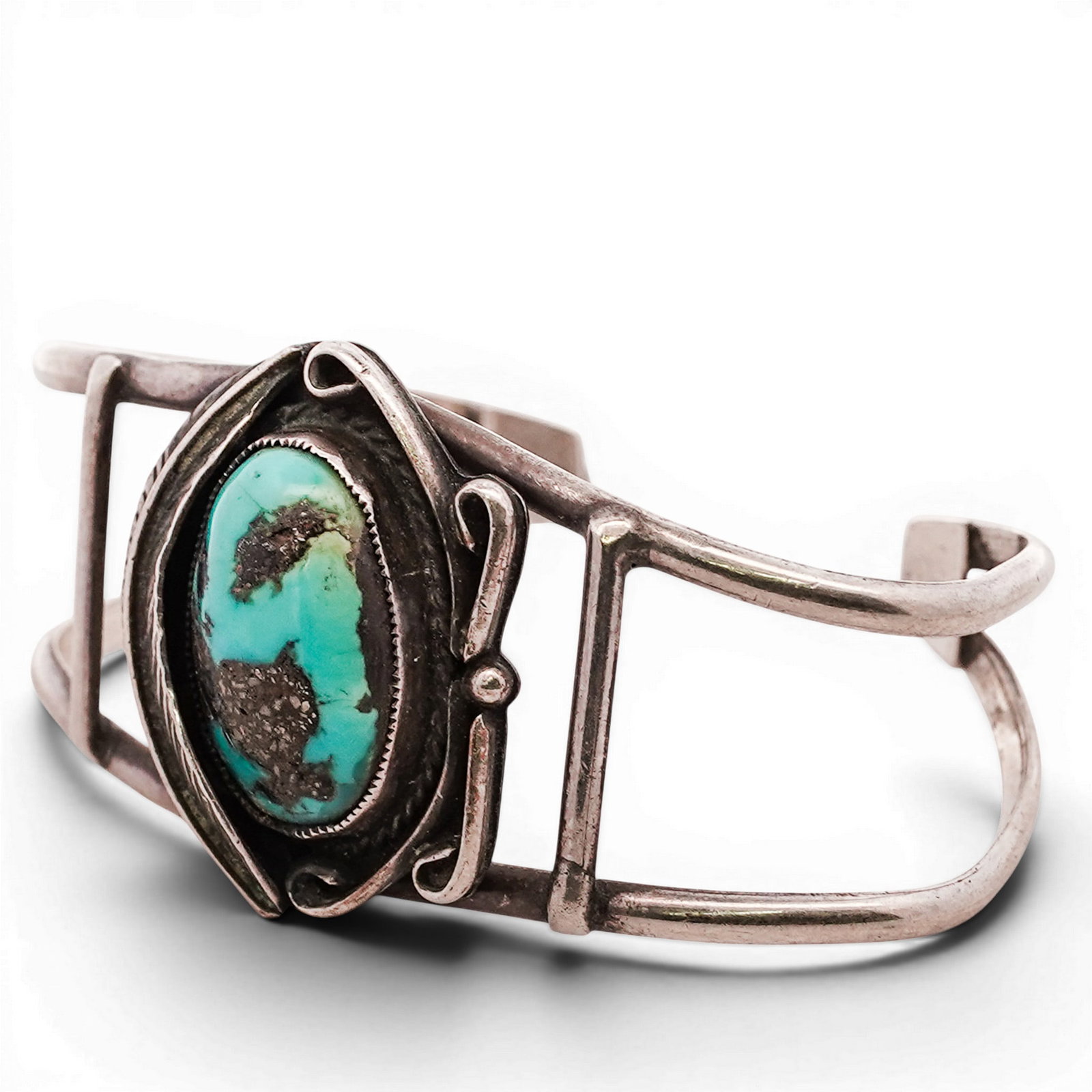 Vintage Southwestern Sterling Silver & Turquoise Cuff Bracelet Signed: Vintage Southwestern Sterling Silver & Turquoise Cuff Bracelet Signed Late 20th Century, USA Vintage southwestern sterling silver cuff set with a large oval turquoise cabochon with matrix, in a bezel 