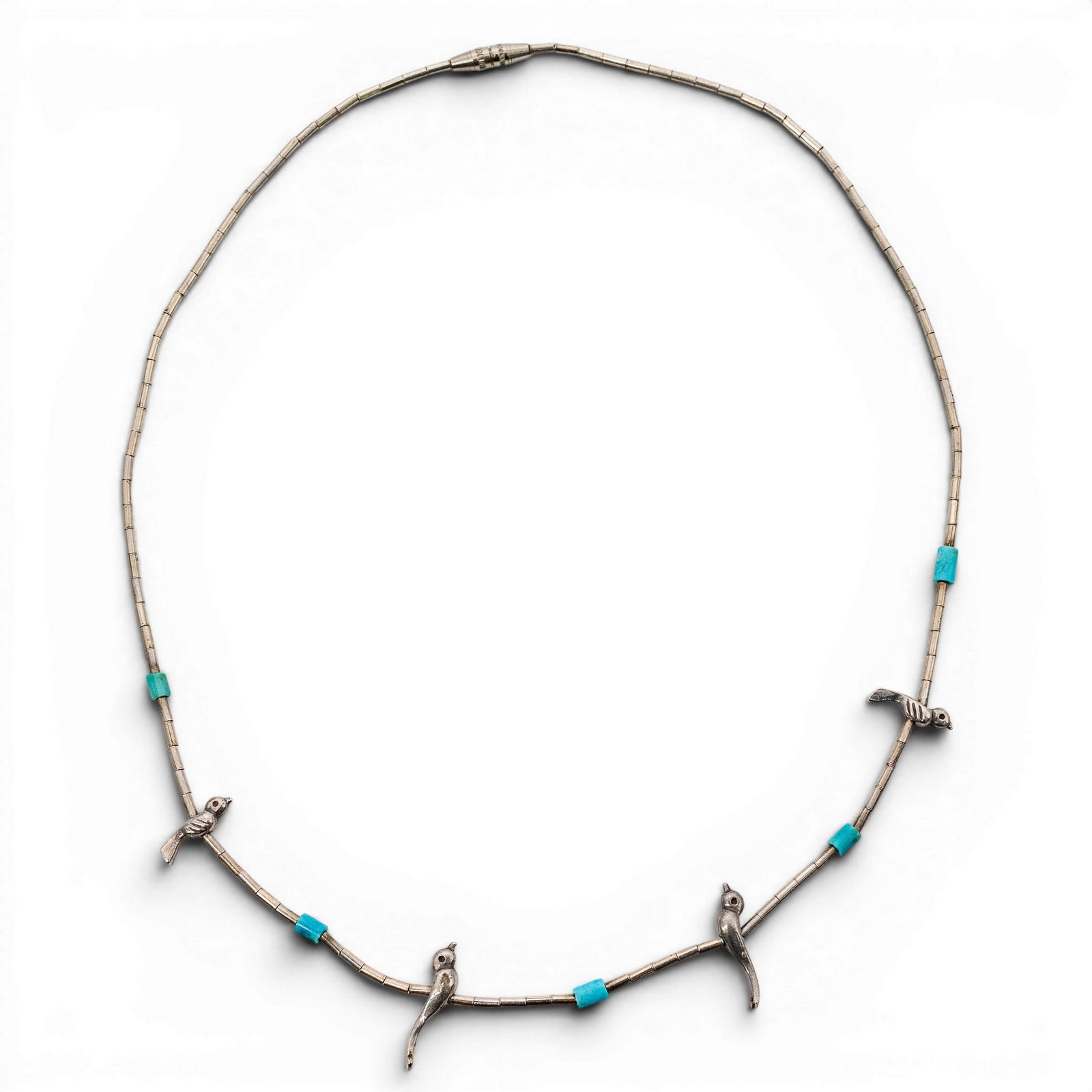 Vintage Navajo Sterling Silver & Turquoise Roadrunner Heishi Necklace: Vintage Navajo Sterling Silver & Turquoise Roadrunner Heishi Necklace 1970s-1980s, USA Vintage Navajo sterling silver necklace composed of narrow tube beads with turquoise cube stations, accented by a