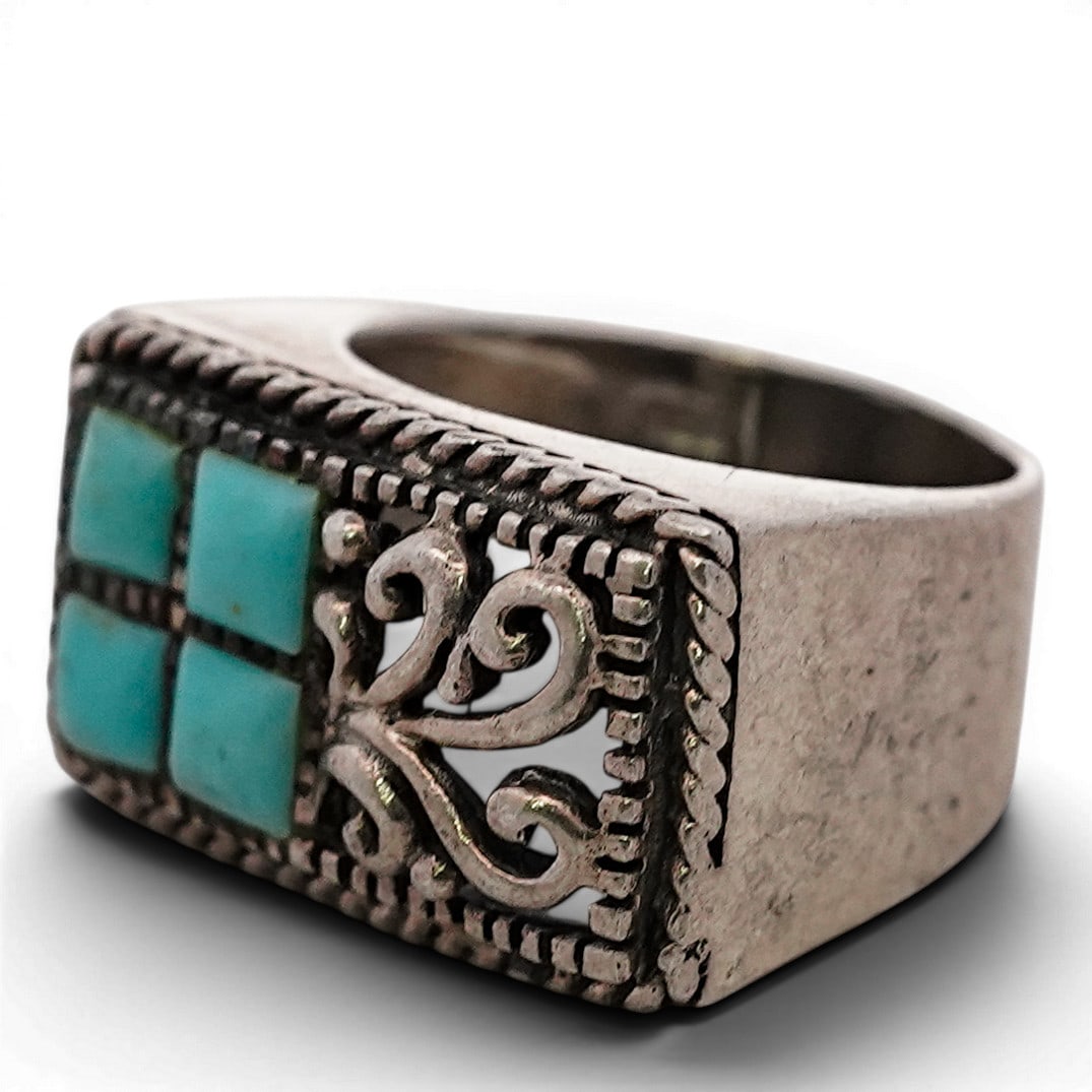 Vintage Navajo Sterling Silver & Turquoise Cluster/Scrollwork Ring: Vintage Navajo Sterling Silver & Turquoise Cluster/Scrollwork Ring 1970s-1980s, USA Vintage Navajo sterling silver ring featuring a rectangular face set with four square turquoise cabochons arranged i