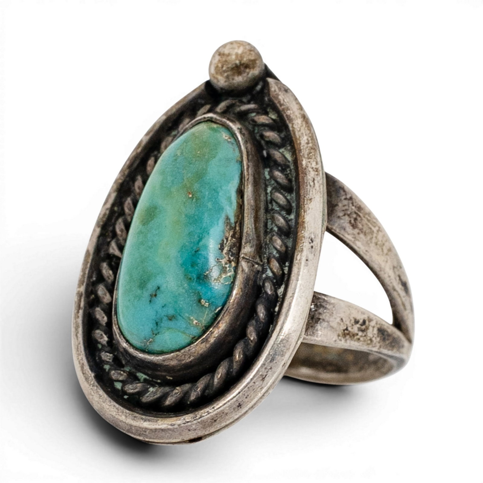 Vintage Navajo Sterling Silver & Oval Turquoise Ring: Vintage Navajo Sterling Silver & Oval Turquoise Ring 1970s-1980s, USA Vintage Navajo sterling silver ring with an oval green turquoise cabochon set in a serrated bezel, framed by twisted wire rope bor