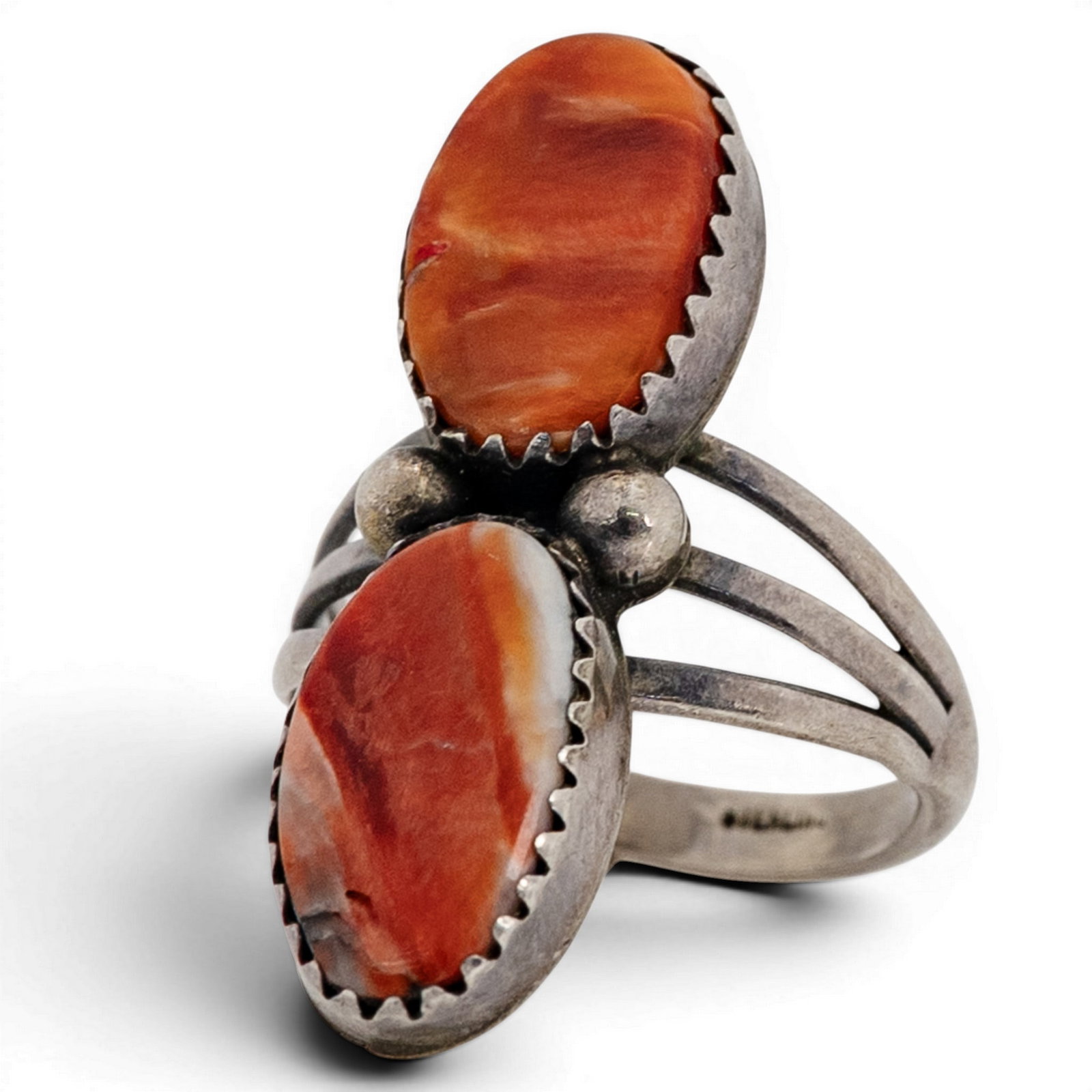 Alvin Begay Navajo Sterling Silver & Spiny Oyster Ring: Alvin Begay Navajo Sterling Silver & Spiny Oyster Ring 1970s-1980s, USA Sterling silver ring by Navajo silversmith Alvin Begay, featuring two elongated spiny oyster shell cabochons set in serrated bez