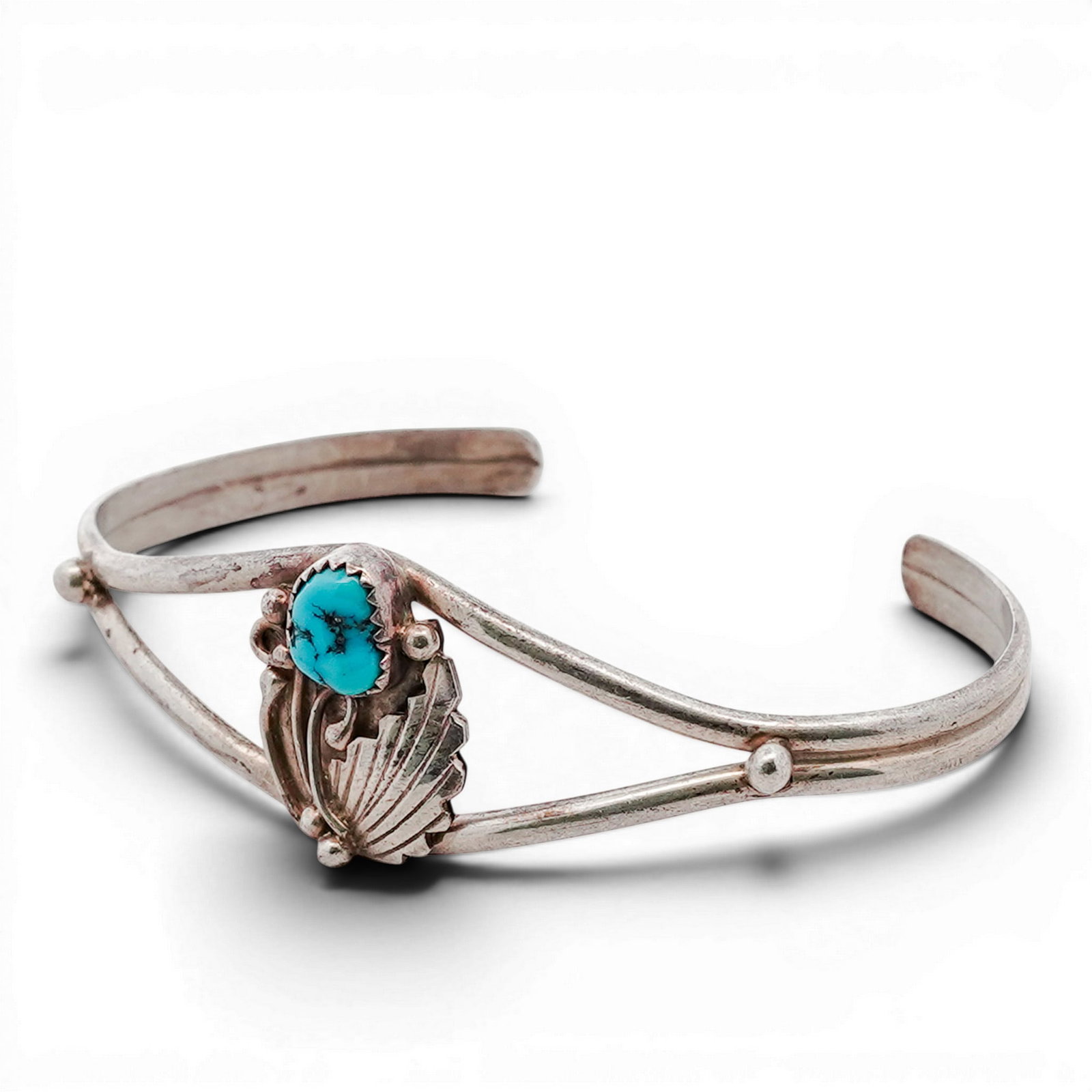 Vintage Navajo Sterling Silver & Turquoise Cuff Bracelet Signed: Vintage Navajo Sterling Silver & Turquoise Cuff Bracelet Signed 1970s-1980s, USA Sterling silver cuff bracelet set with an irregular cabochon turquoise stone in a serrated bezel, accented with applied