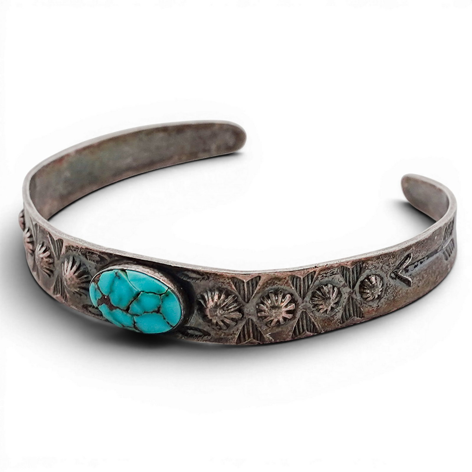 Vintage Navajo Sterling Silver & Turquoise Stamped Cuff Bracelet: Vintage Navajo Sterling Silver & Turquoise Stamped Cuff Bracelet 1970s-1980s, USA Vintage Navajo sterling silver cuff bracelet set with an oval turquoise cabochon displaying brown matrix, mounted in a