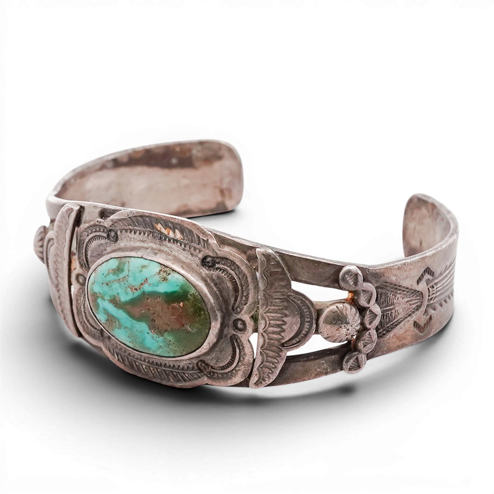 Vintage Navajo Sterling Silver & Turquoise Cuff Bracelet: Vintage Navajo Sterling Silver & Turquoise Cuff Bracelet 1970s-1980s, USA Hand-stamped cuff bracelet centered with an oval turquoise cabochon in a plain bezel, set within a wide stamped silver plaque.