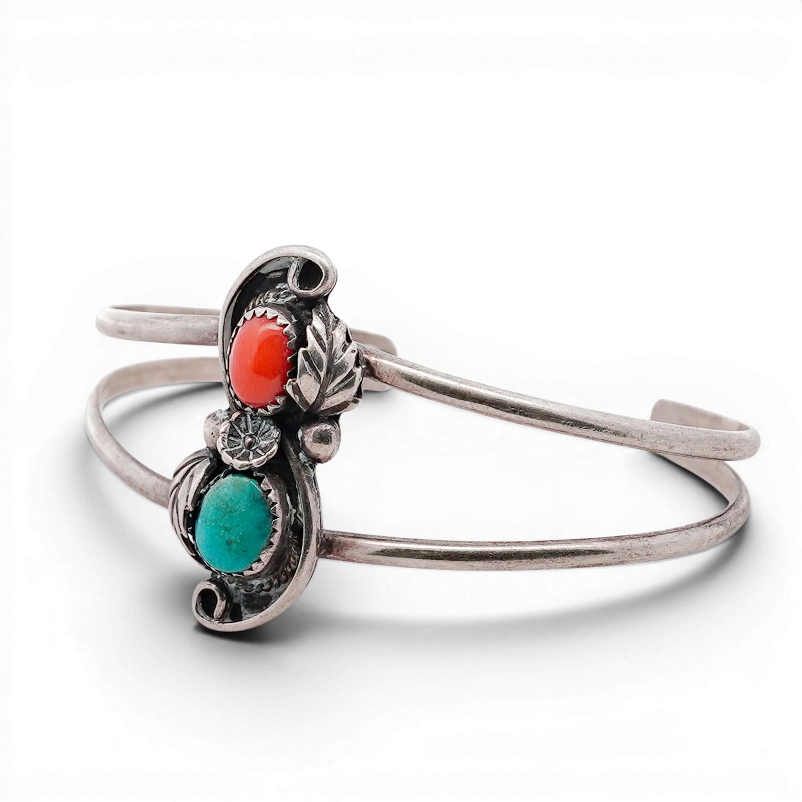 Vintage Navajo Sterling Silver Turquoise & Coral Cuff Bracelet Signed: Vintage Navajo Sterling Silver Turquoise & Coral Cuff Bracelet Signed 1970s-1980s, USA Sterling silver cuff set with vertically arranged oval turquoise and coral cabochons in serrated bezels, framed b