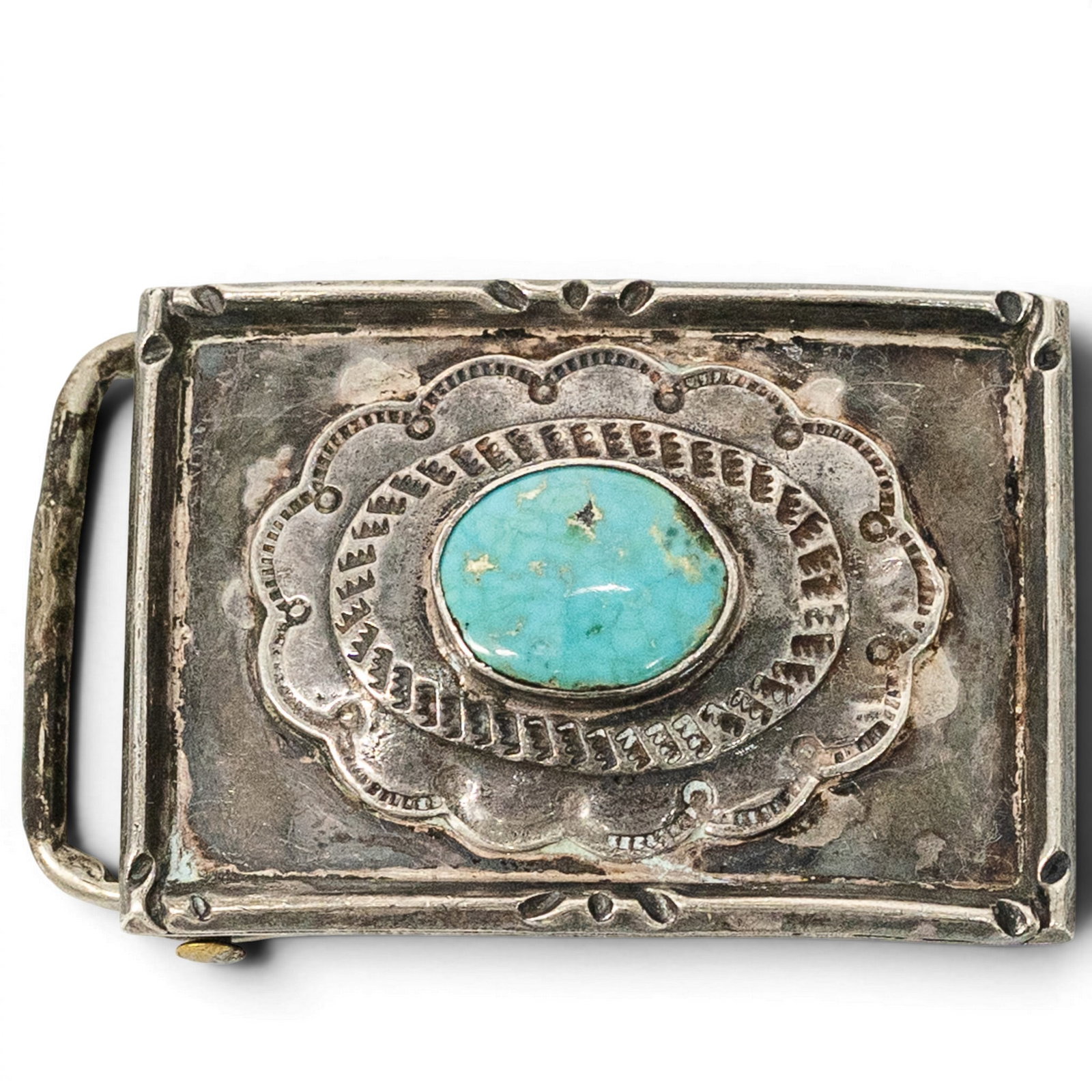 Vintage Navajo Sterling Silver & Turquoise Belt Buckle: Vintage Navajo Sterling Silver & Turquoise Belt Buckle 1970s-1980s, USA Vintage Navajo sterling silver rectangular belt buckle set with an oval turquoise cabochon in a plain bezel, accented by stamped