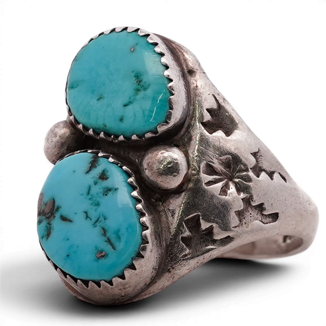Vintage Navajo Sterling Silver & Double Turquoise Ring: Vintage Navajo Sterling Silver & Double Turquoise Ring 1970s-1980s, USA Vintage Navajo sterling silver ring set with two oval turquoise cabochons in serrated bezels, joined by applied silver bead acce