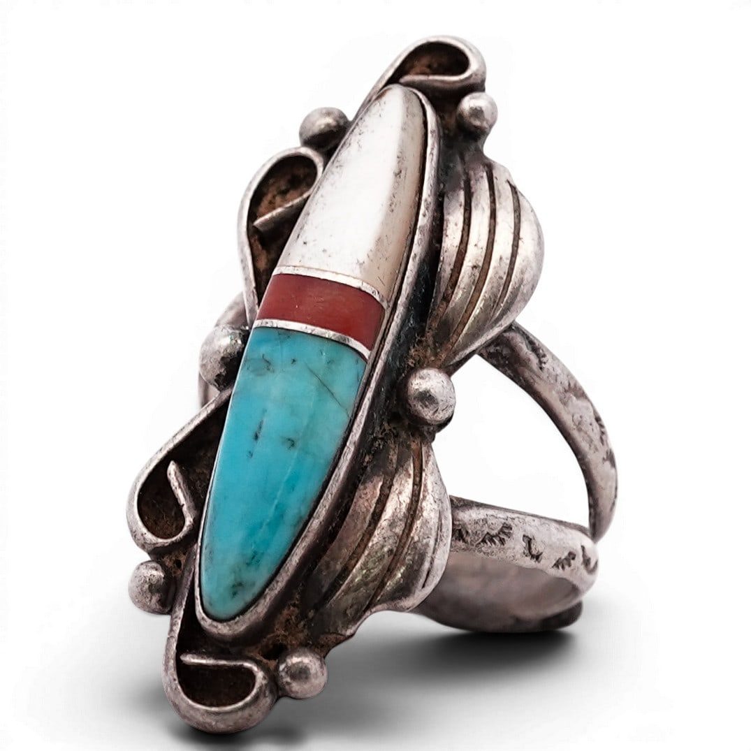 Vintage Zuni Sterling Silver Turquoise Coral & Shell Inlay Ring: Vintage Zuni Sterling Silver Turquoise Coral & Shell Inlay Ring 1970s-1980s, USA Sterling silver ring set with a long, tapered inlay panel composed of turquoise, coral, and white shell arranged in a l