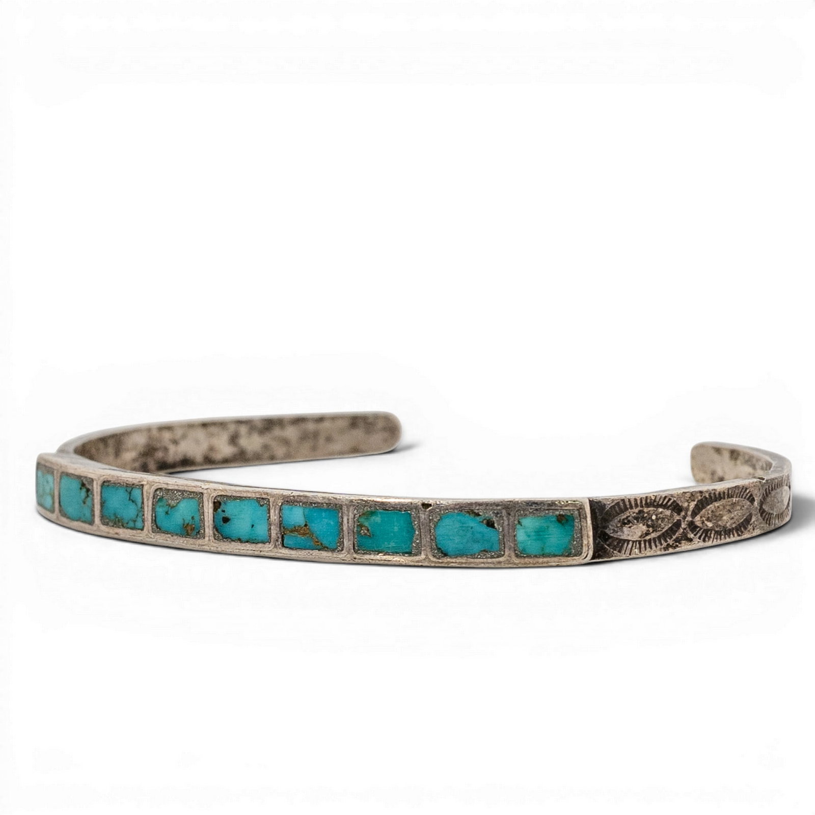 Vintage Navajo Sterling Silver & Turquoise Inlay Cuff Bracelet: Vintage Navajo Sterling Silver & Turquoise Inlay Cuff Bracelet 1970s-1980s, USA Slim sterling silver cuff bracelet featuring a linear channel inlay of rectangular turquoise segments, each set within a