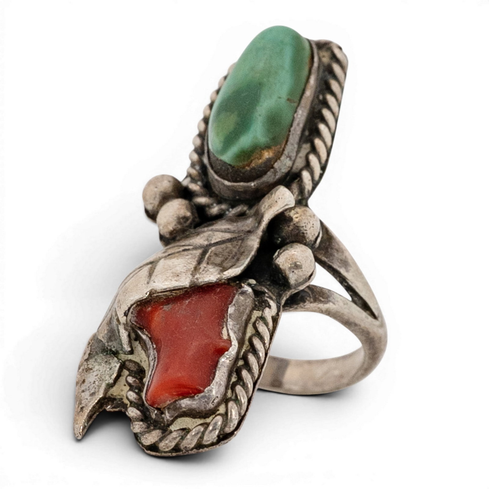 Navajo Sterling Silver Coral & Turquoise Leaf Motif Ring Signed: Navajo Sterling Silver Coral & Turquoise Leaf Motif Ring Signed 1970s-1980s, USA Vertical double-stone ring featuring an oval turquoise cabochon with natural matrix and an elongated coral cabochon, ea