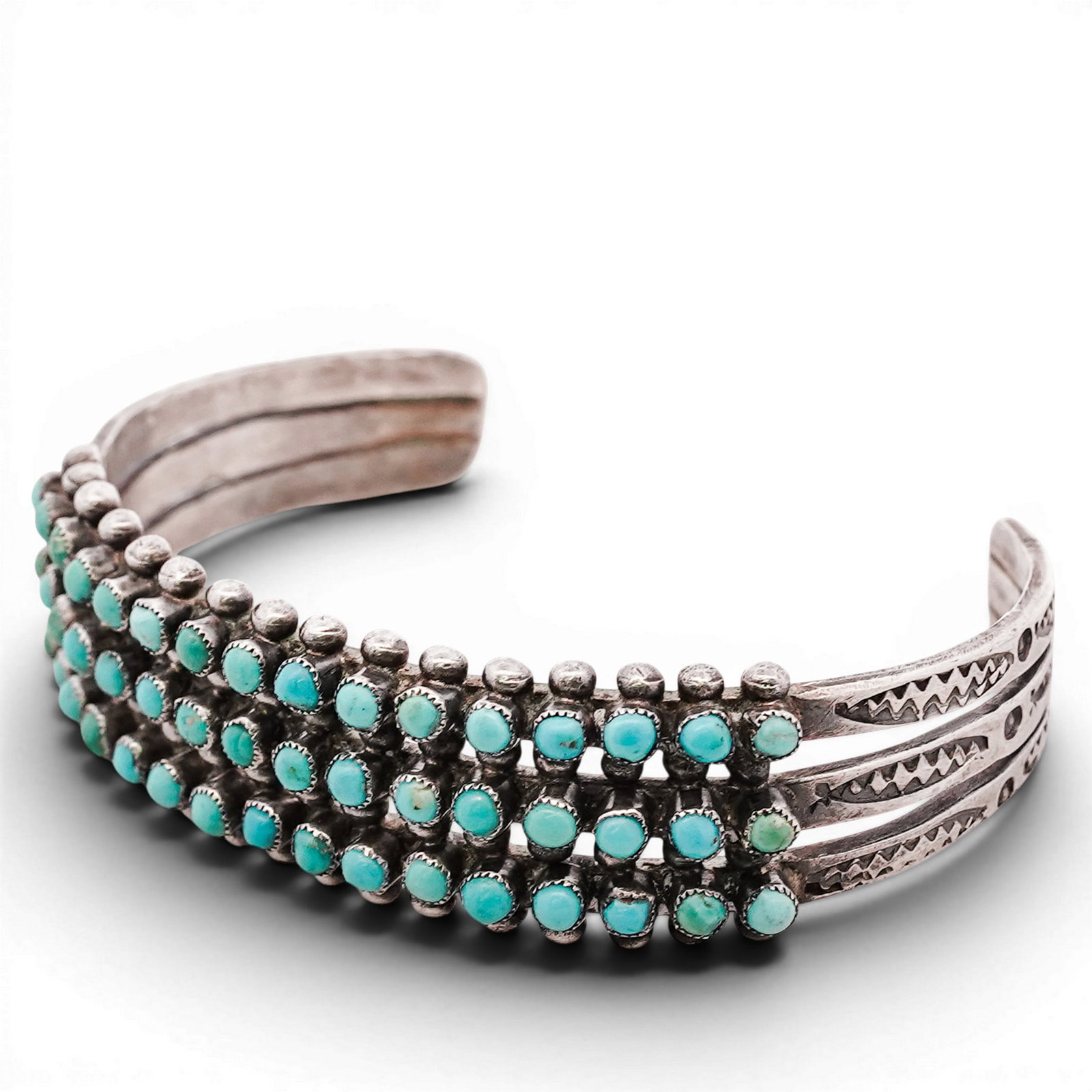 Vintage Zuni Sterling Silver & Turquoise Cluster Cuff Bracelet Signed: Vintage Zuni Sterling Silver & Turquoise Cluster Cuff Bracelet Signed Late 20th Century, USA Vintage Zuni sterling silver cuff set with rows of small round turquoise cabochons in cluster formation, wi