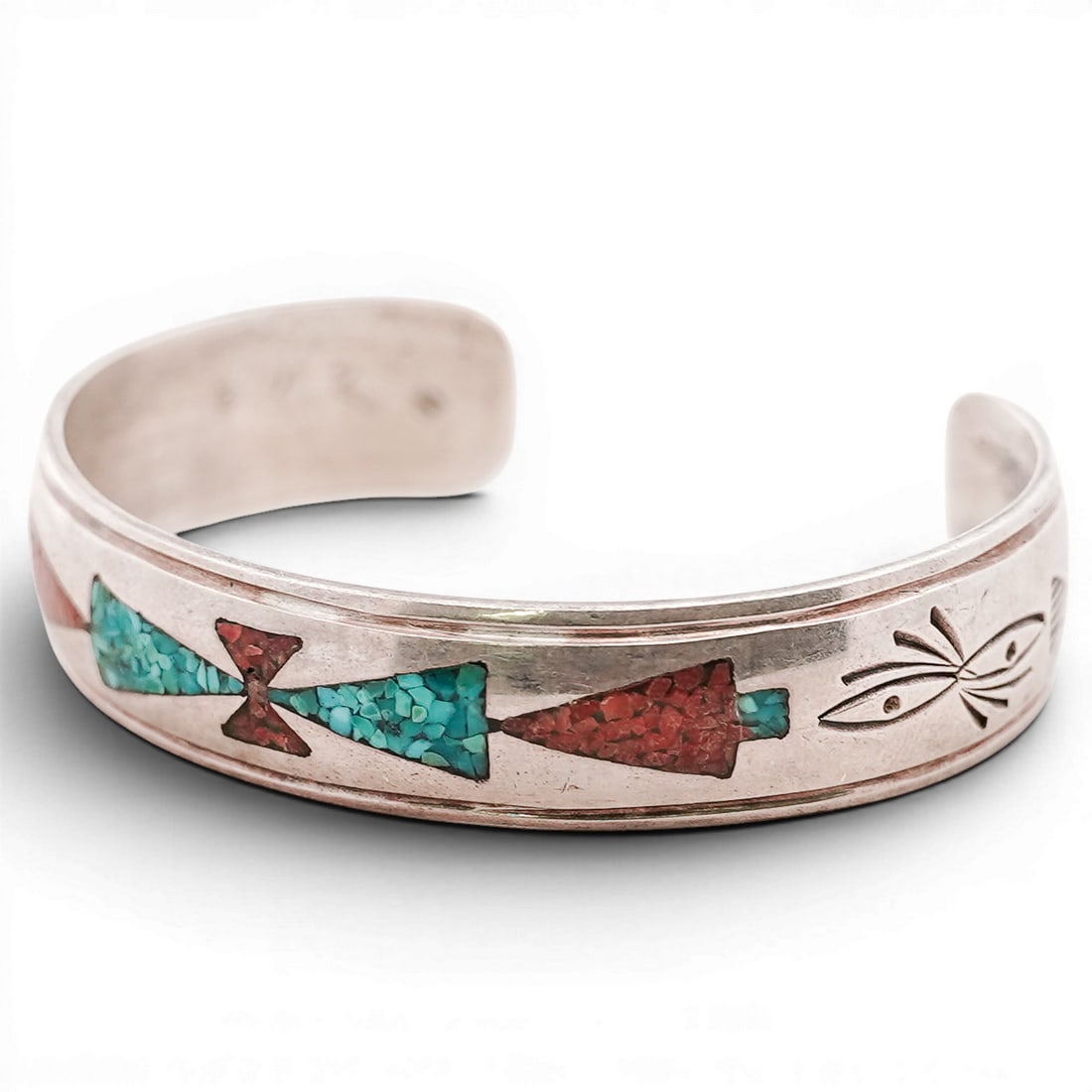 Vintage Southwestern Sterling Silver Turquoise& Coral Inlay Cuff Bracelet: Vintage Southwestern Sterling Silver Turquoise& Coral Inlay Cuff Bracelet Late 20th Century, USA Sterling silver cuff with geometric inlay of turquoise and coral chips. Interior with small stamped hal