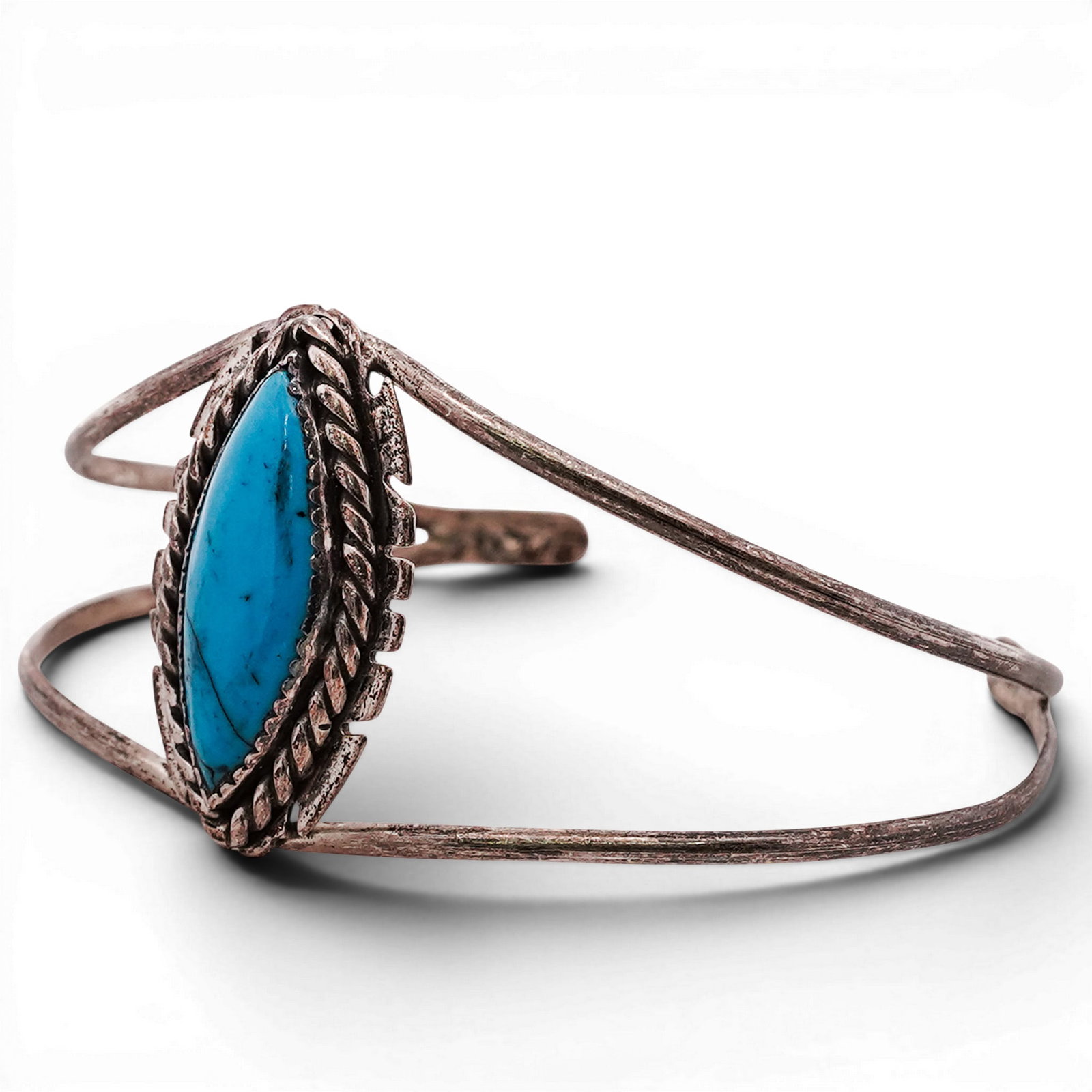 Navajo Sterling Silver & Turquoise Cuff Bracelet Signed: Navajo Sterling Silver & Turquoise Cuff Bracelet Signed 2000, USA Sterling silver cuff set with a marquise turquoise cabochon in a rope-twist bezel, with applied feather and arrow elements. Reverse wi