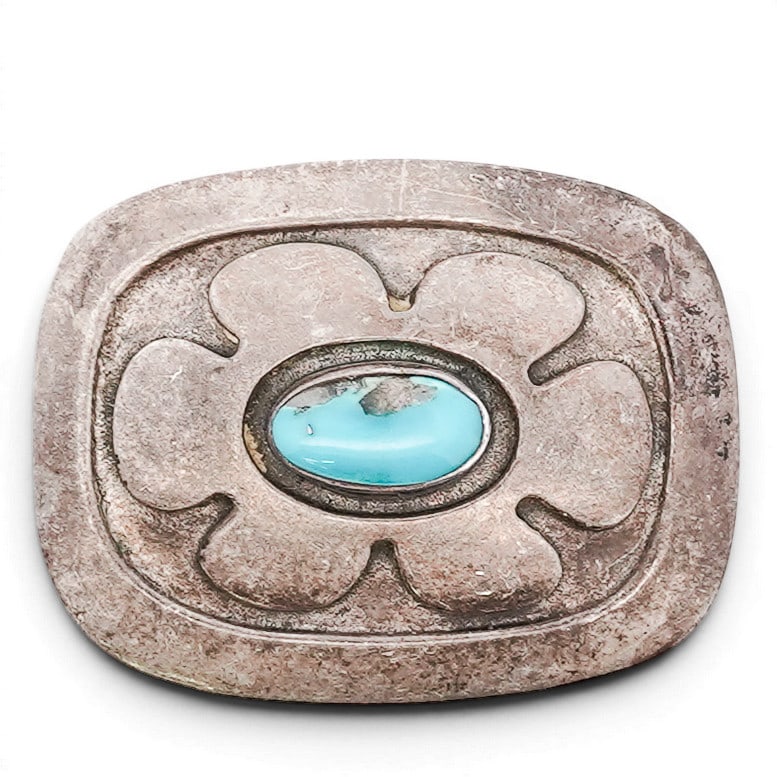 Vintage Southwest Sterling Silver & Turquoise Belt Buckle: Vintage Southwest Sterling Silver & Turquoise Belt Buckle Late 20th Century, USA Vintage sterling silver belt buckle of rectangular form with stamped foliate motif centered by a single oval turquoise 
