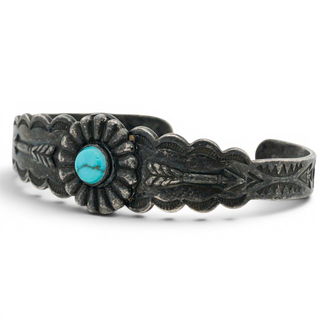 Vintage Navajo Sterling Silver & Turquoise Concho Stamped Cuff Bracelet: Vintage Navajo Sterling Silver & Turquoise Concho Stamped Cuff Bracelet 1970s-1980s, USA Sterling silver bar-form bracelet centered by a scalloped concho element set with a round turquoise cabochon, f