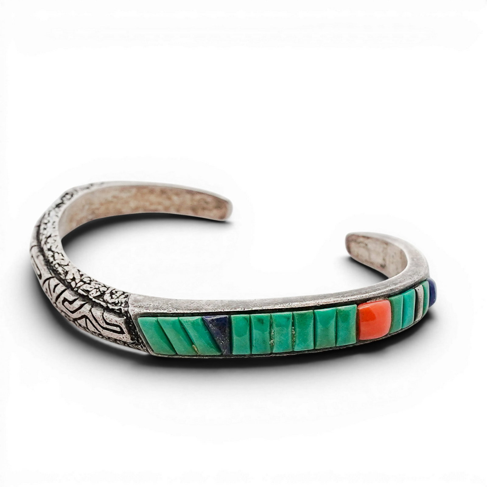 Vintage Southwestern Sterling Silver Inlay Cuff Bracelet: Vintage Southwestern Sterling Silver Inlay Cuff Bracelet 1970s-1980s, USA Sterling silver cuff bracelet featuring a channel inlay panel composed of green turquoise segments, a lapis lazuli accent and 