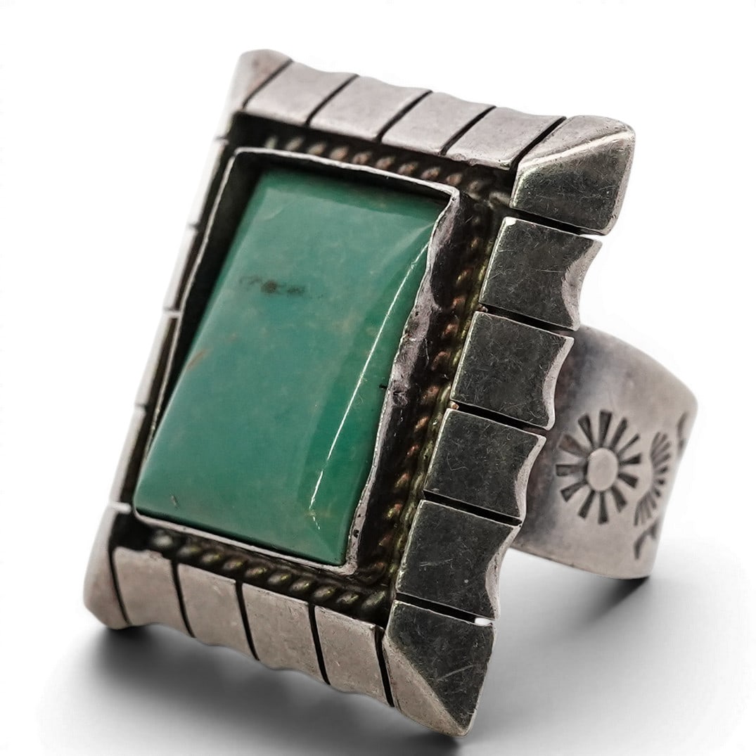 Vintage Running Bear Navajo Sterling Silver & Green Turquoise Ring: Vintage Running Bear Navajo Sterling Silver & Green Turquoise Ring 1980s-1990s, USA Heavy vintage Navajo sterling silver ring featuring a rectangular green turquoise cabochon in serrated bezel setting