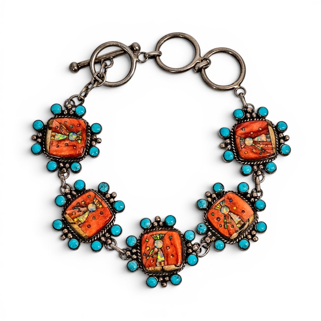 Sterling Silver Turquoise & Opal Inlay Link Bracelet: Sterling Silver Turquoise & Opal Inlay Link Bracelet Late 20th century, Philippines Sterling silver link bracelet with five square coral-colored inlay panels depicting multicolor opal inlay figural de