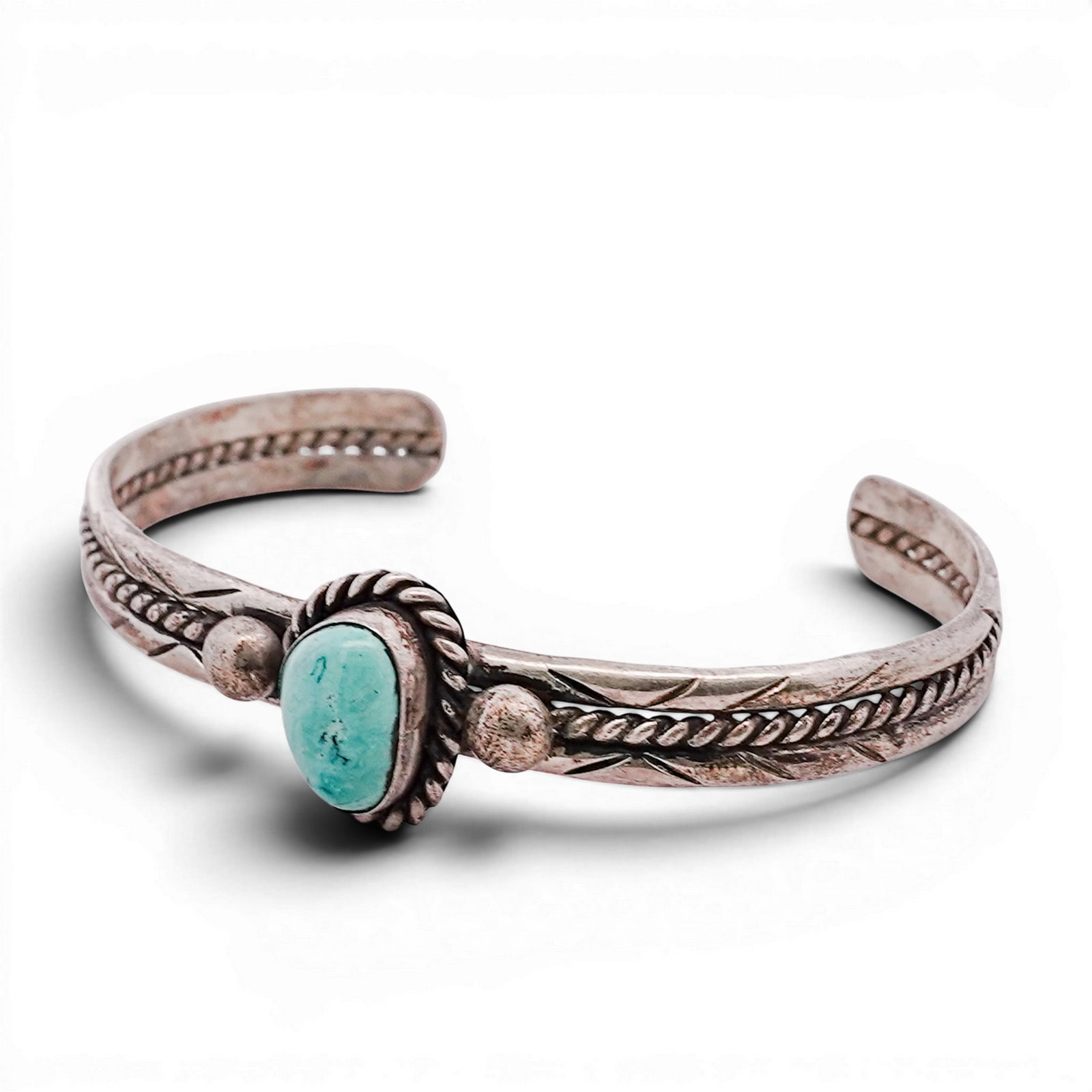 Vintage Southwestern Sterling Silver & Turquoise Cuff Bracelet: Vintage Southwestern Sterling Silver & Turquoise Cuff Bracelet 1970s-1980s, USA Vintage sterling silver cuff bracelet set with a single oval turquoise cabochon in a serrated bezel, flanked by applied 