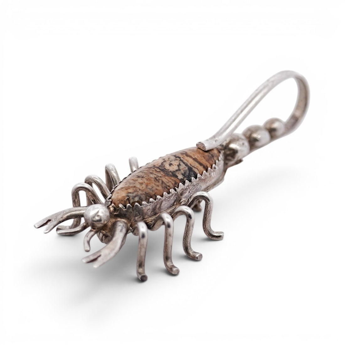 Sterling Silver & Jasper Figural Scorpion Pendant Brooch: Sterling Silver & Jasper Figural Scorpion Pendant Brooch 1950s-1970s Figural scorpion pendant brooch constructed in sterling silver with applied wirework legs and segmented tail. The body is set with 