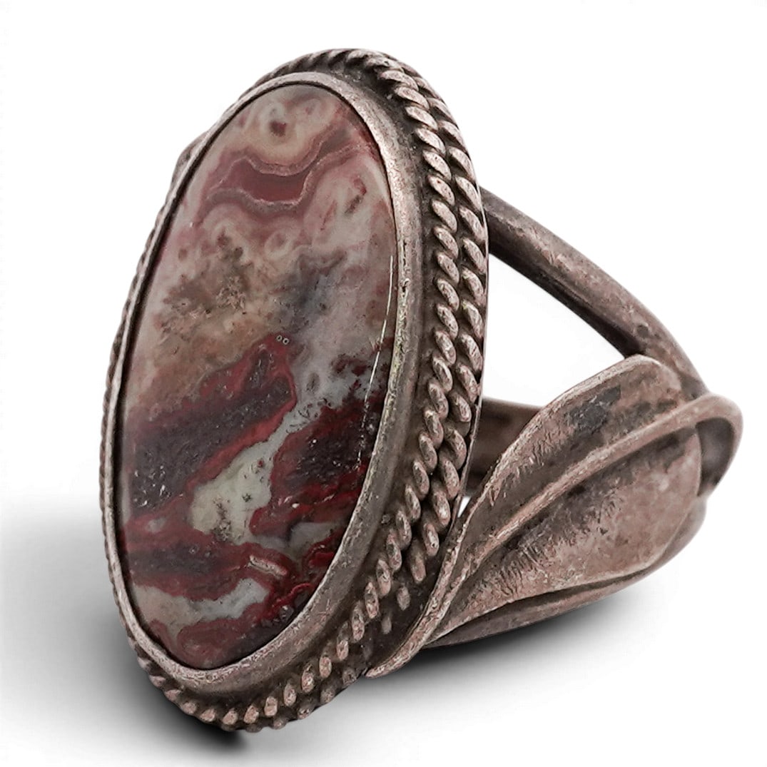 Vintage Navajo Sterling Silver & Jasper Ring: Vintage Navajo Sterling Silver & Jasper Ring 1970s-1980s, USA Vintage Navajo sterling silver ring set with an elongated oval jasper cabochon displaying red, cream, and brown banded matrix. The stone i
